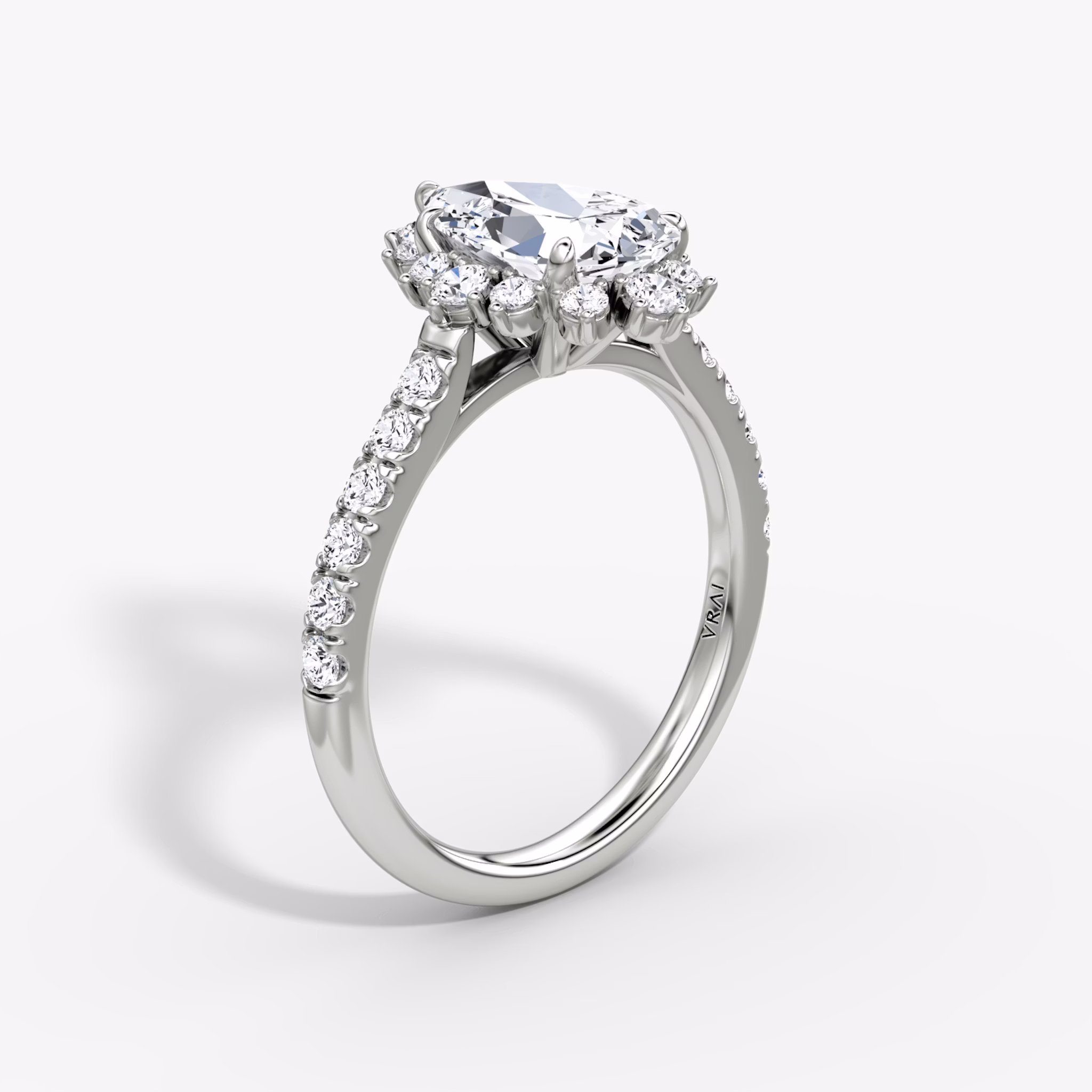 The Aurora Halo | Pear | 18k | White Gold | bandAccent: Pavé | diamondOrientation: vertical | caratWeight: other