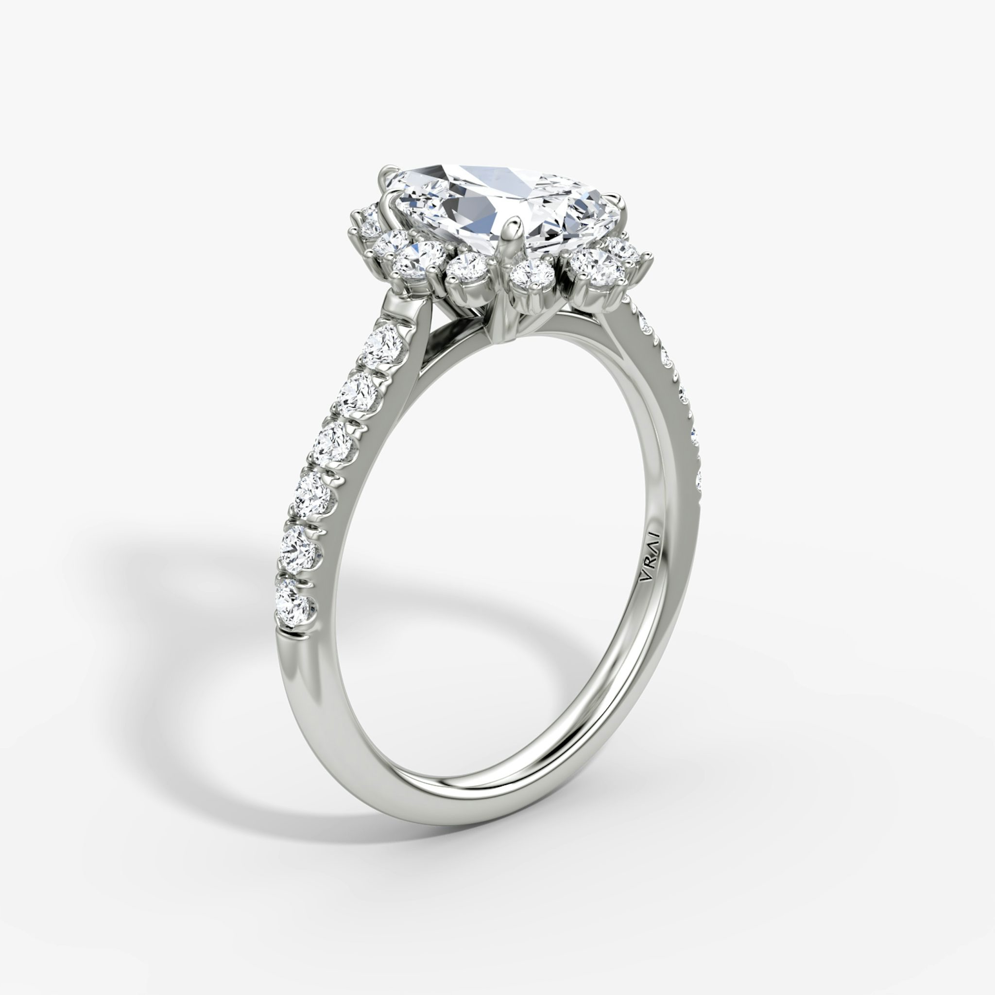 The Aurora Halo | Pear | 18k | White Gold | bandAccent: Pavé | diamondOrientation: vertical | caratWeight: other