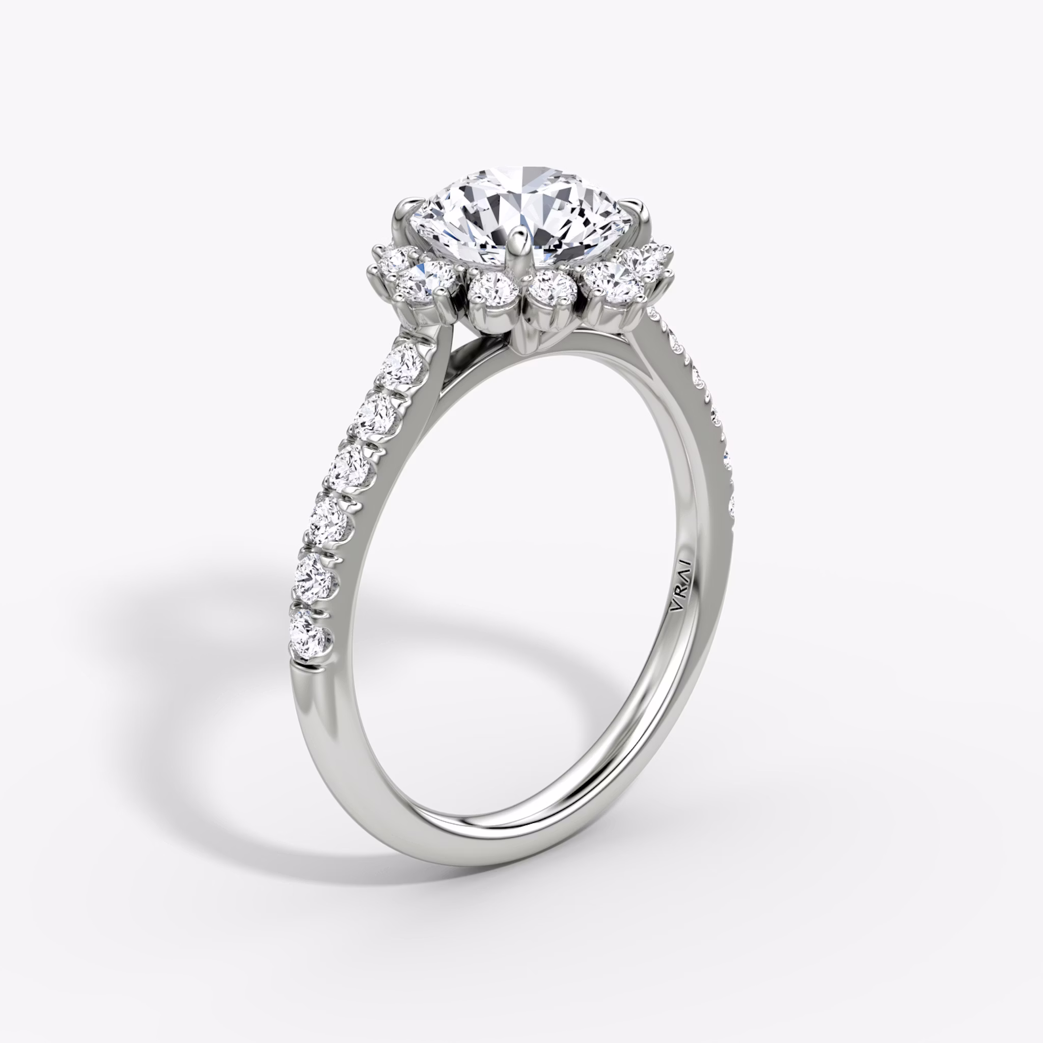 The Aurora Halo | Round Brilliant | 18k | White Gold | bandAccent: Pavé | caratWeight: other | diamondOrientation: vertical