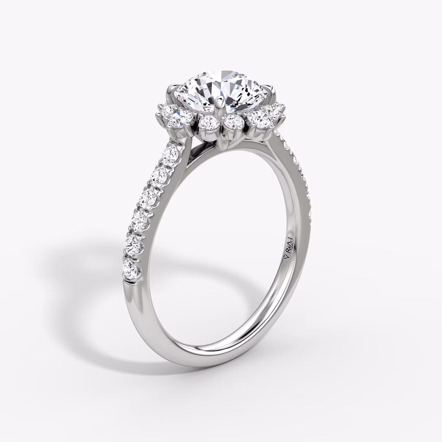 The Aurora Halo | Round Brilliant | Platinum | bandAccent: Pavé | caratWeight: 1.0ct | diamondOrientation: vertical