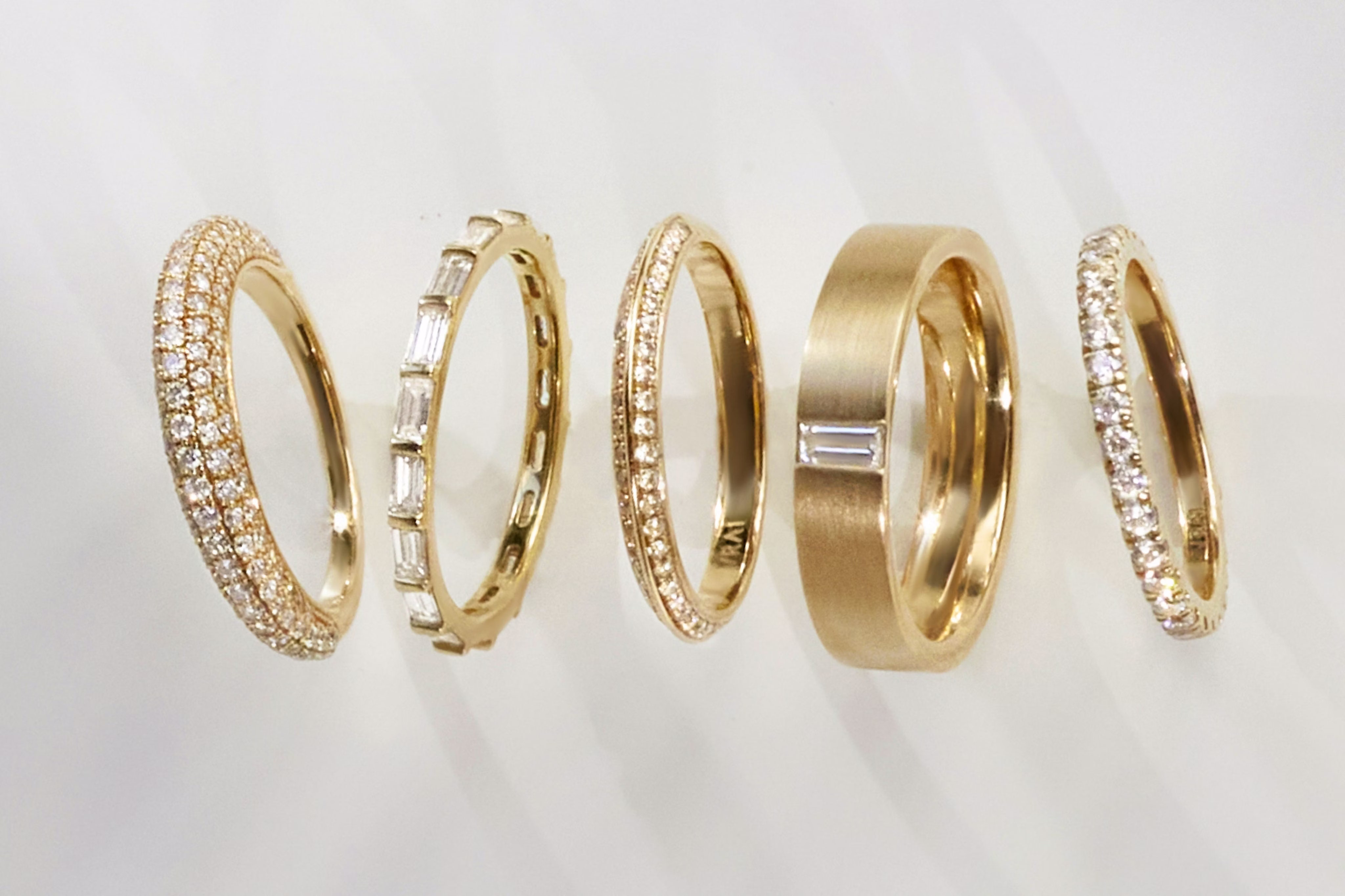 Five different types of rings including pave ring, signet ring and more