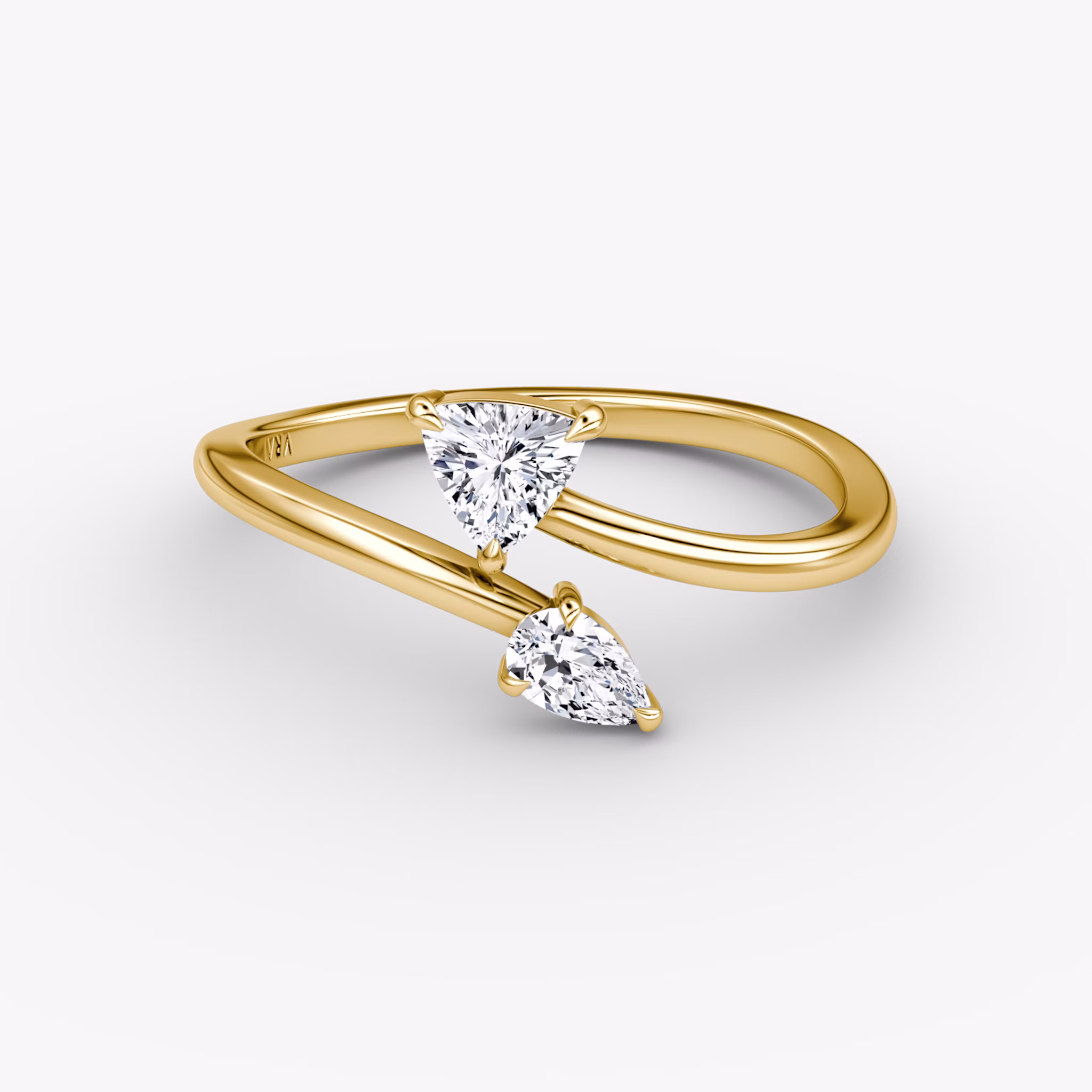 A Bypass Cuff Ring in gold.