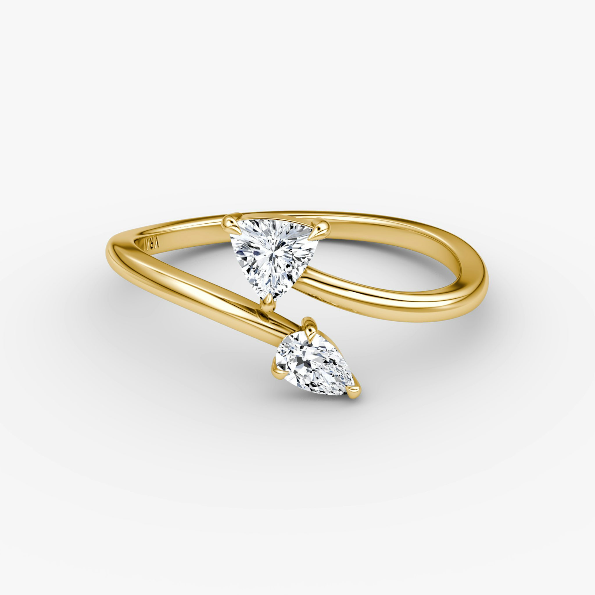 A Bypass Cuff Ring in gold.