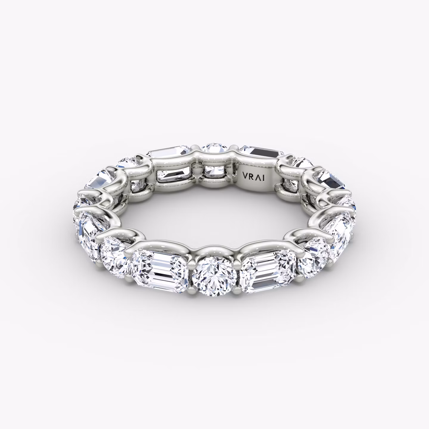 The Alternating Shapes Eternity Band Round Brilliant and Emerald | Platinum