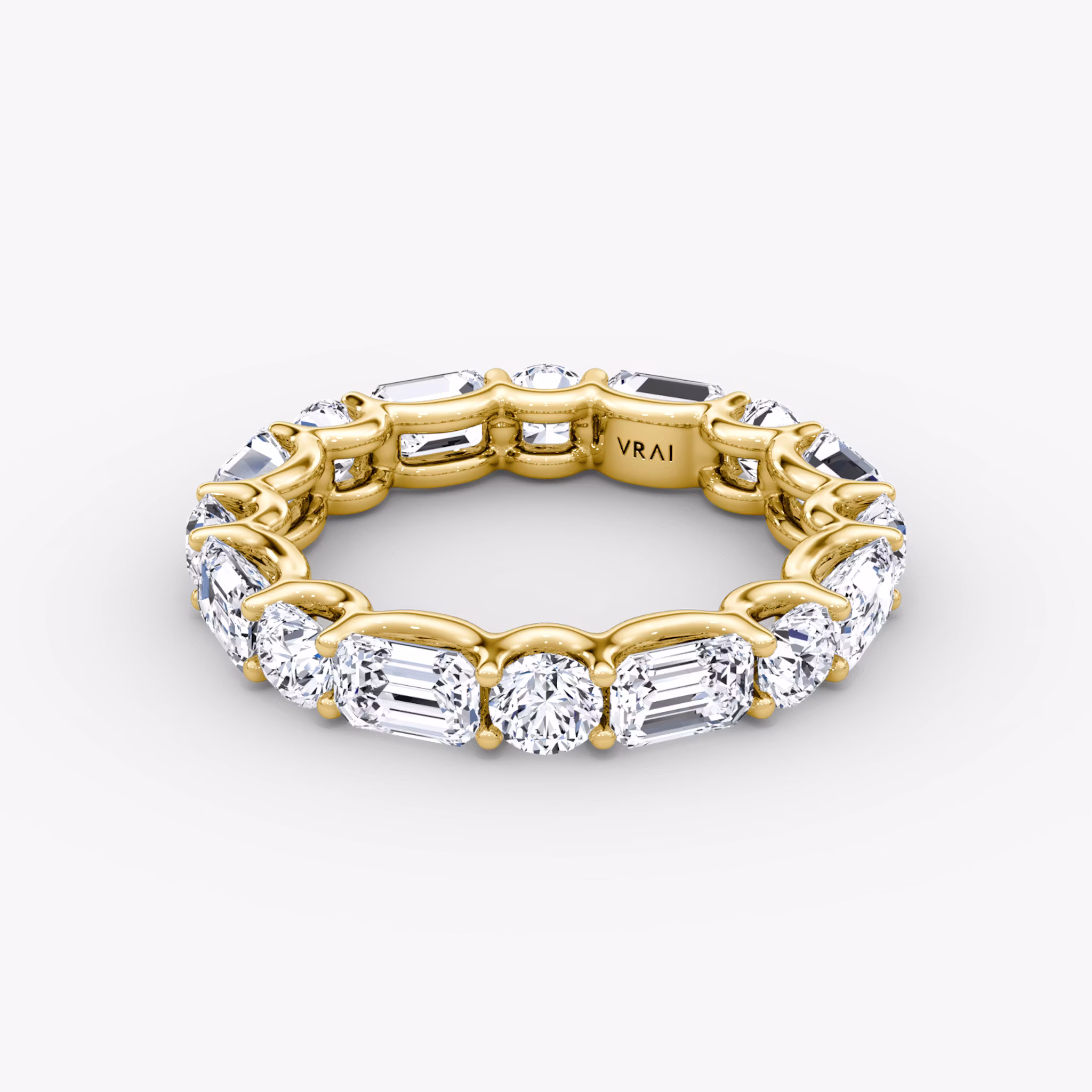 The Alternating Shapes Eternity Band Round Brilliant and Emerald | Yellow Gold