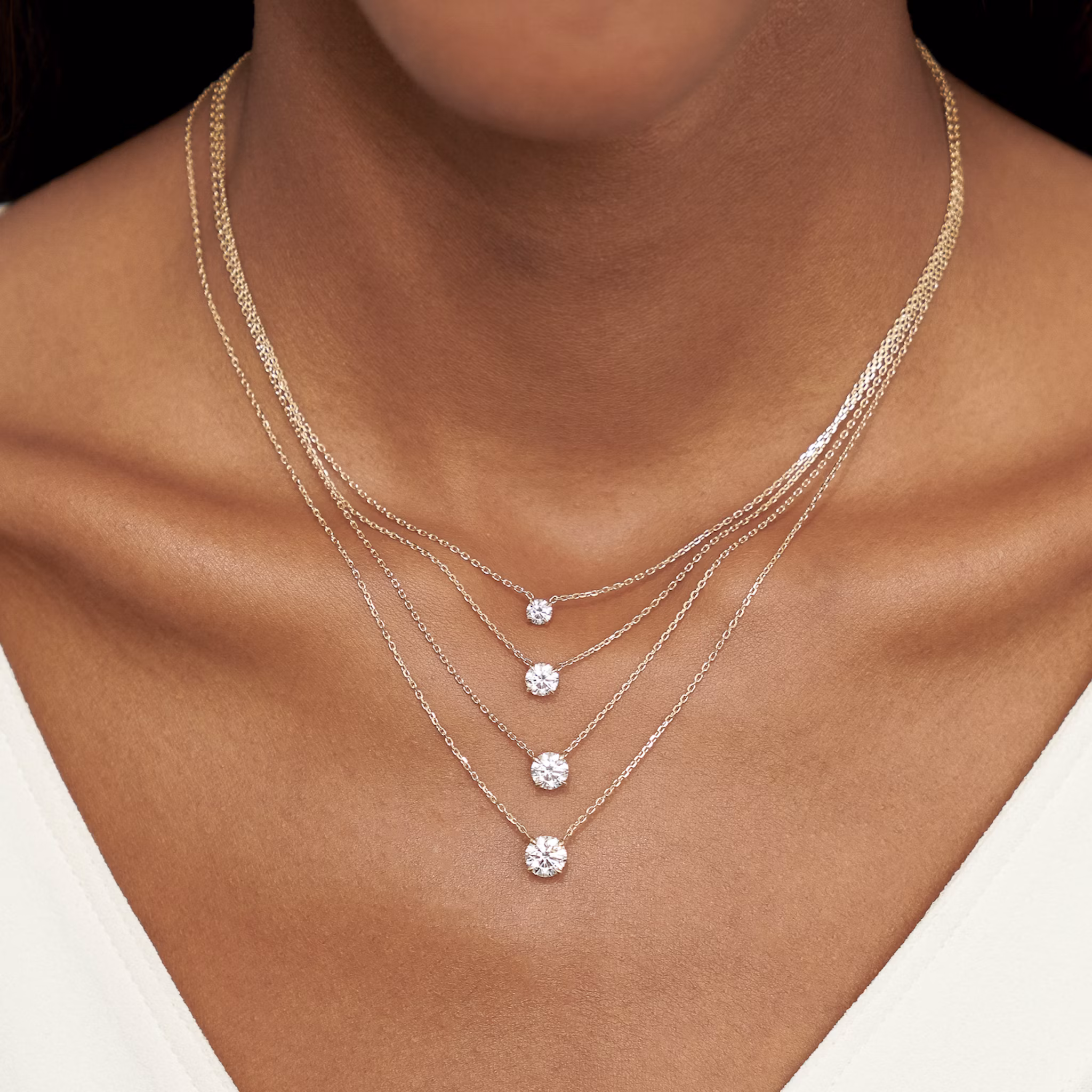 Mostrado con 1/4 ct, 1/2 ct, 3/4 ct, 1.0 ct