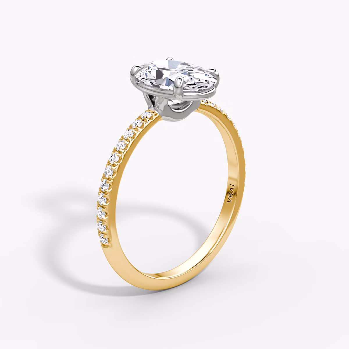 The Signature | Oval | 18k | Yellow Gold and Platinum | bandAccent: Pavé | bandWidth: standard | hiddenHalo: no | diamondOrientation: vertical | caratWeight: other
