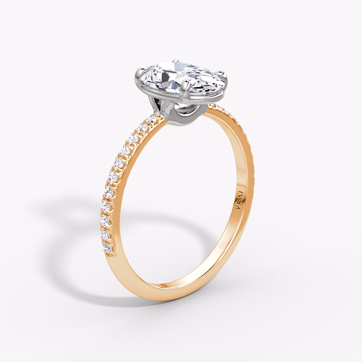 The Signature | Oval | 14k | Rose Gold and Platinum | bandAccent: Pavé | bandWidth: standard | hiddenHalo: no | diamondOrientation: vertical | caratWeight: other