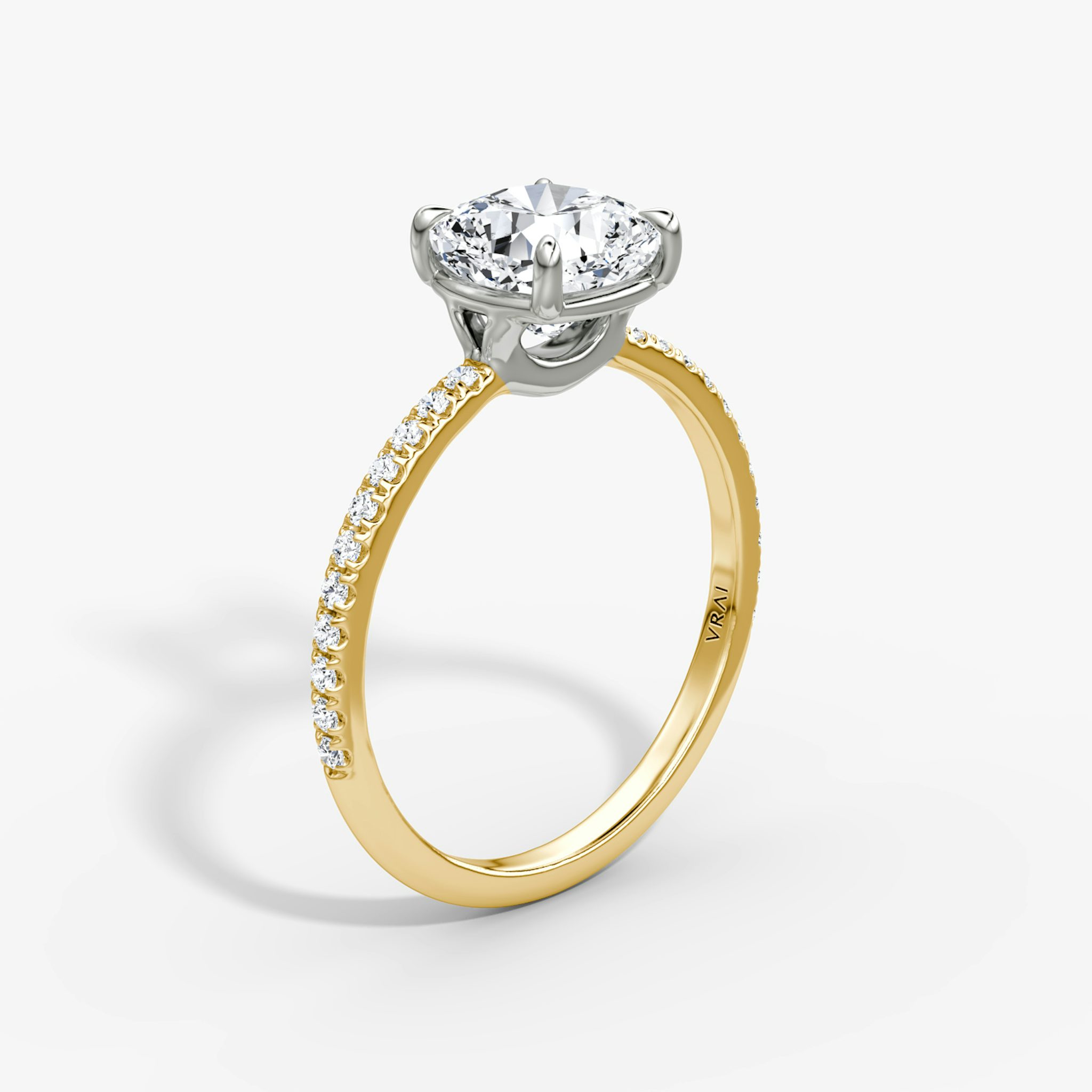 The Signature | Cushion | 18k | Yellow Gold and Platinum | bandAccent: Pavé | bandWidth: standard | hiddenHalo: no | diamondOrientation: vertical | caratWeight: other