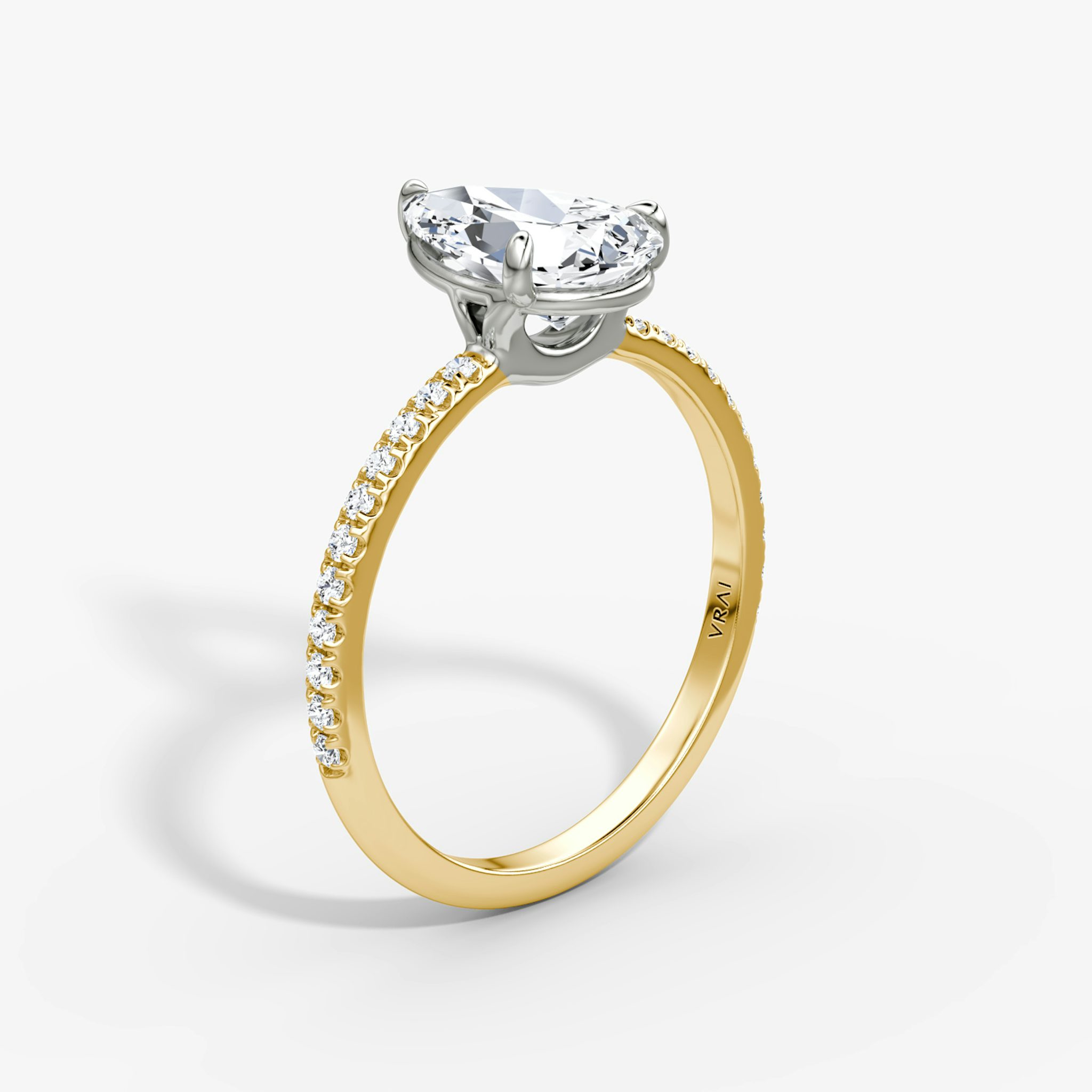 The Signature | Pear | 18k | Yellow Gold and Platinum | bandAccent: Pavé | bandWidth: standard | hiddenHalo: no | diamondOrientation: vertical | caratWeight: other