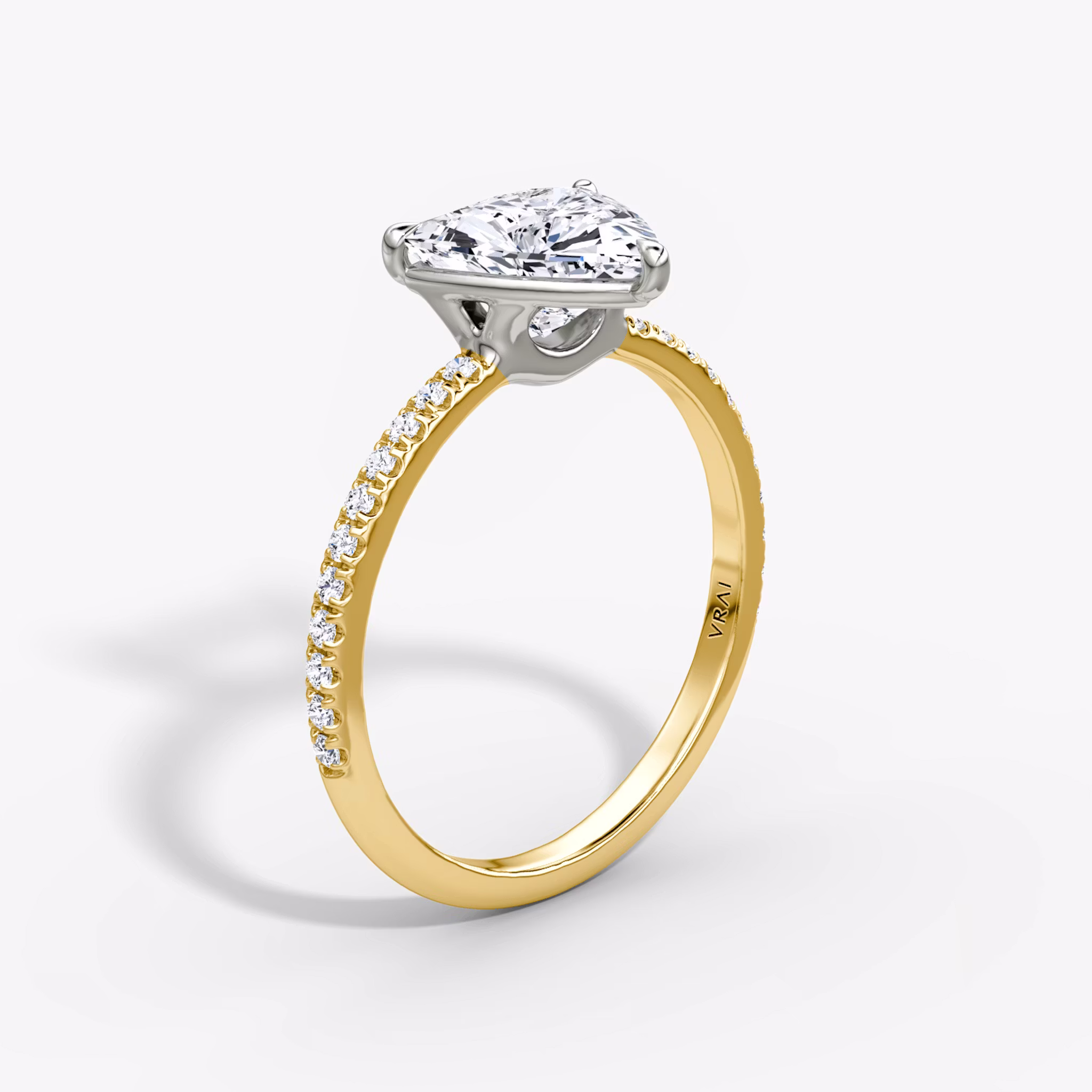 The Signature Trillion | 18K Yellow Gold and Platinum