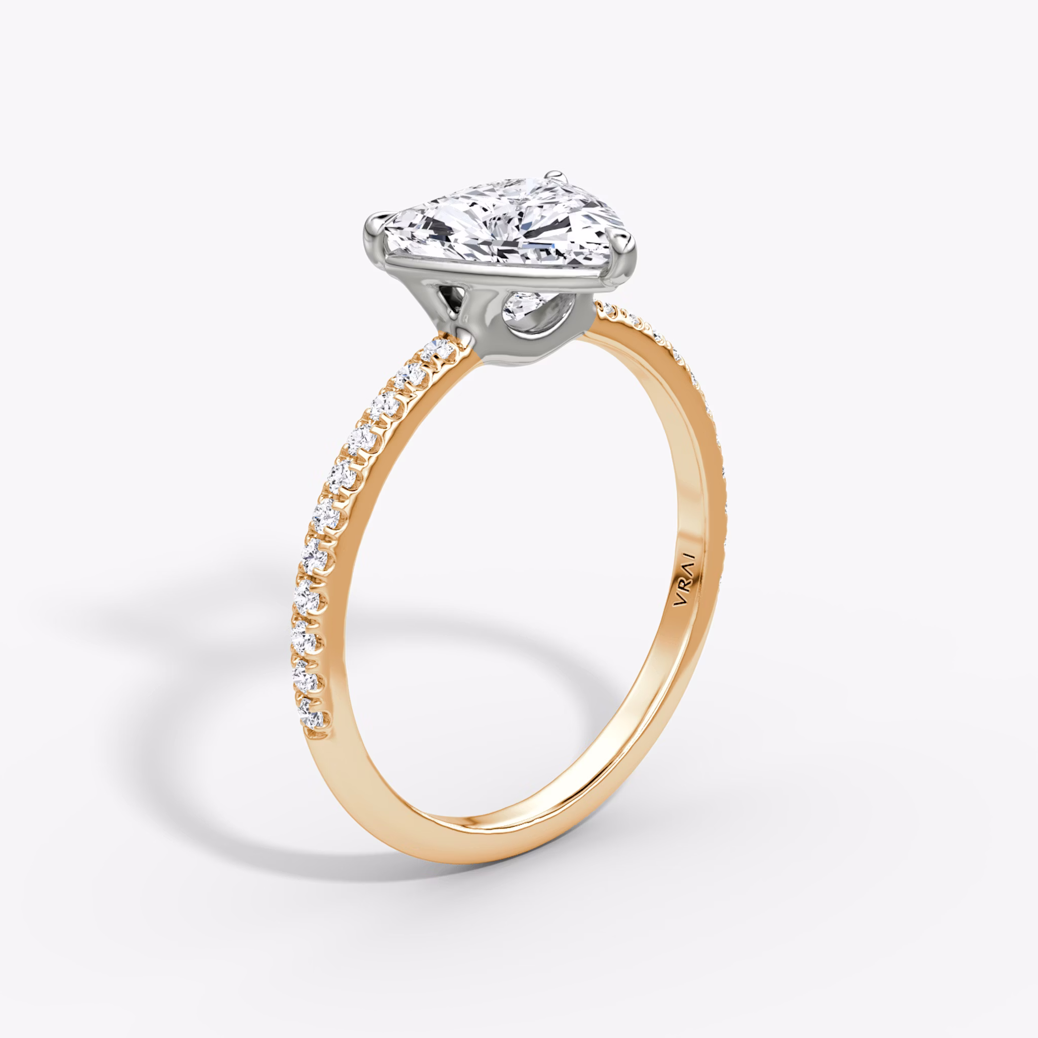 The Signature | Trillion | 14k | Rose Gold and Platinum | bandAccent: Pavé | bandWidth: standard | hiddenHalo: no | diamondOrientation: vertical | caratWeight: other