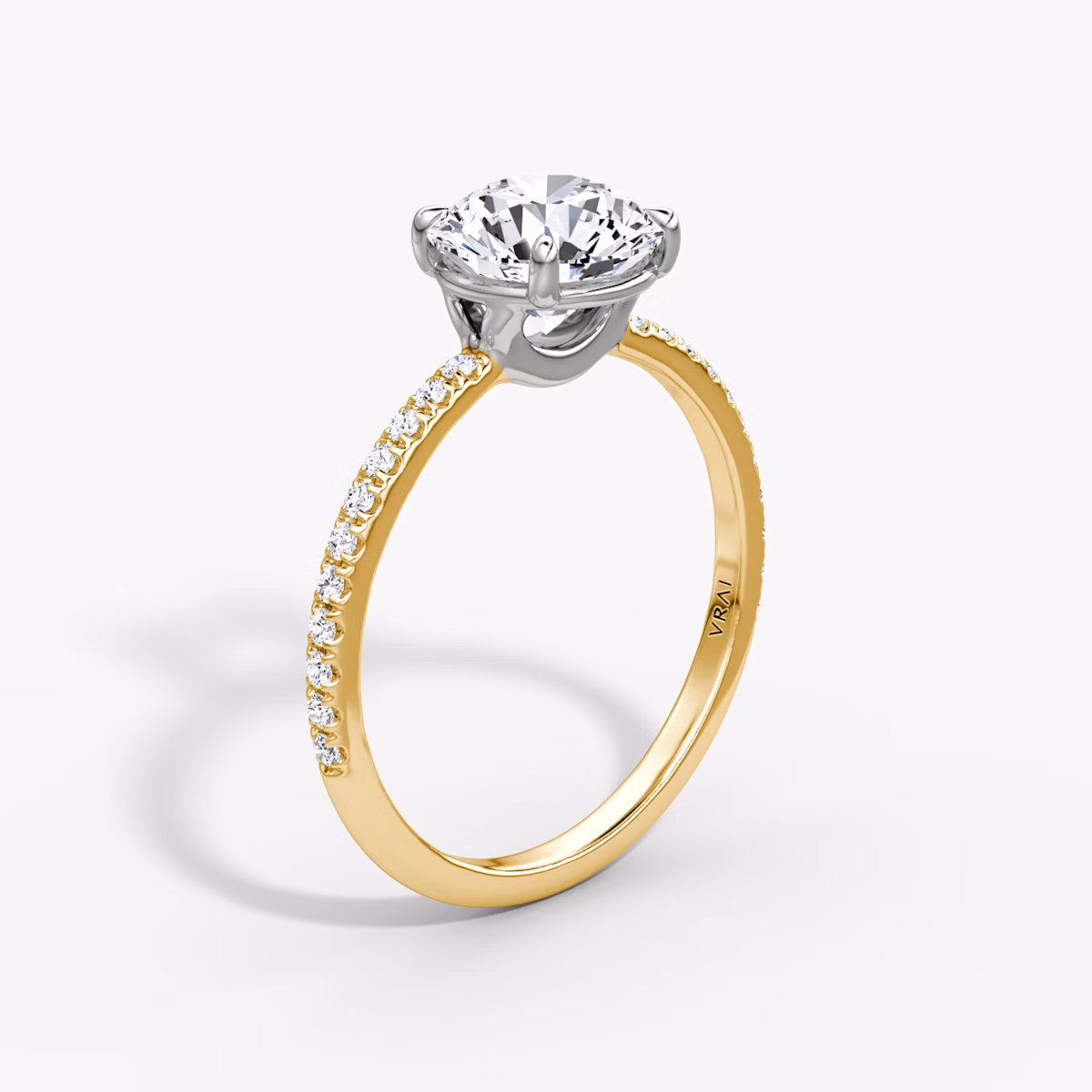 The Signature | Round Brilliant | 18k | Yellow Gold and Platinum | bandAccent: Pavé | bandWidth: standard | caratWeight: 1.0ct | hiddenHalo: no | diamondOrientation: vertical