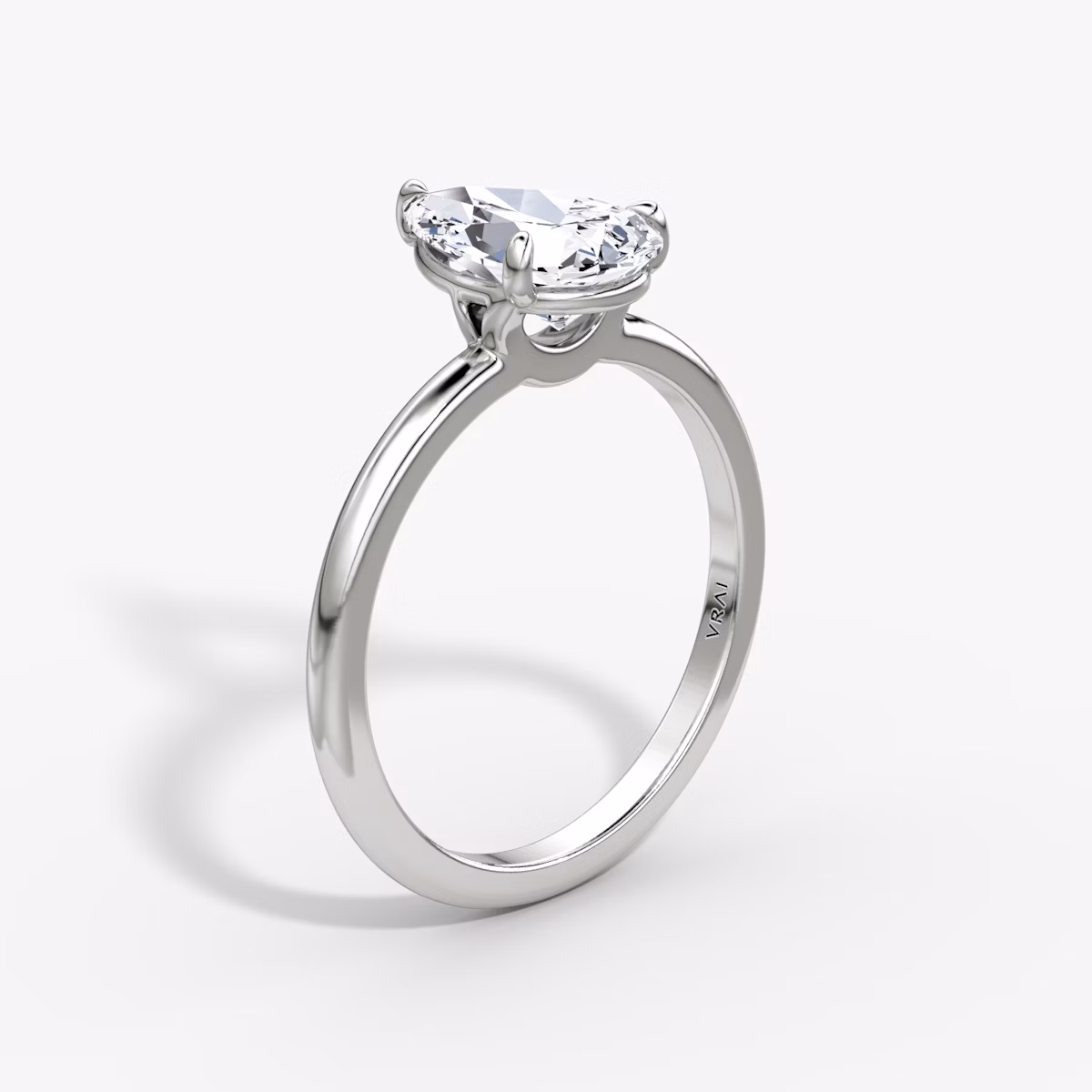The Signature | Pear | 18k | White Gold | bandAccent: Plain | bandWidth: standard | hiddenHalo: no | diamondOrientation: vertical | caratWeight: other