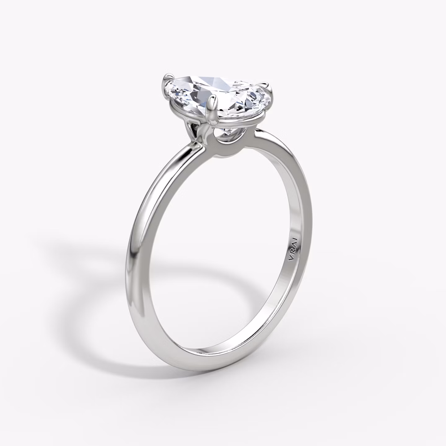 The Signature | Pear | Platinum | bandAccent: Plain | bandWidth: standard | hiddenHalo: no | diamondOrientation: vertical | caratWeight: other
