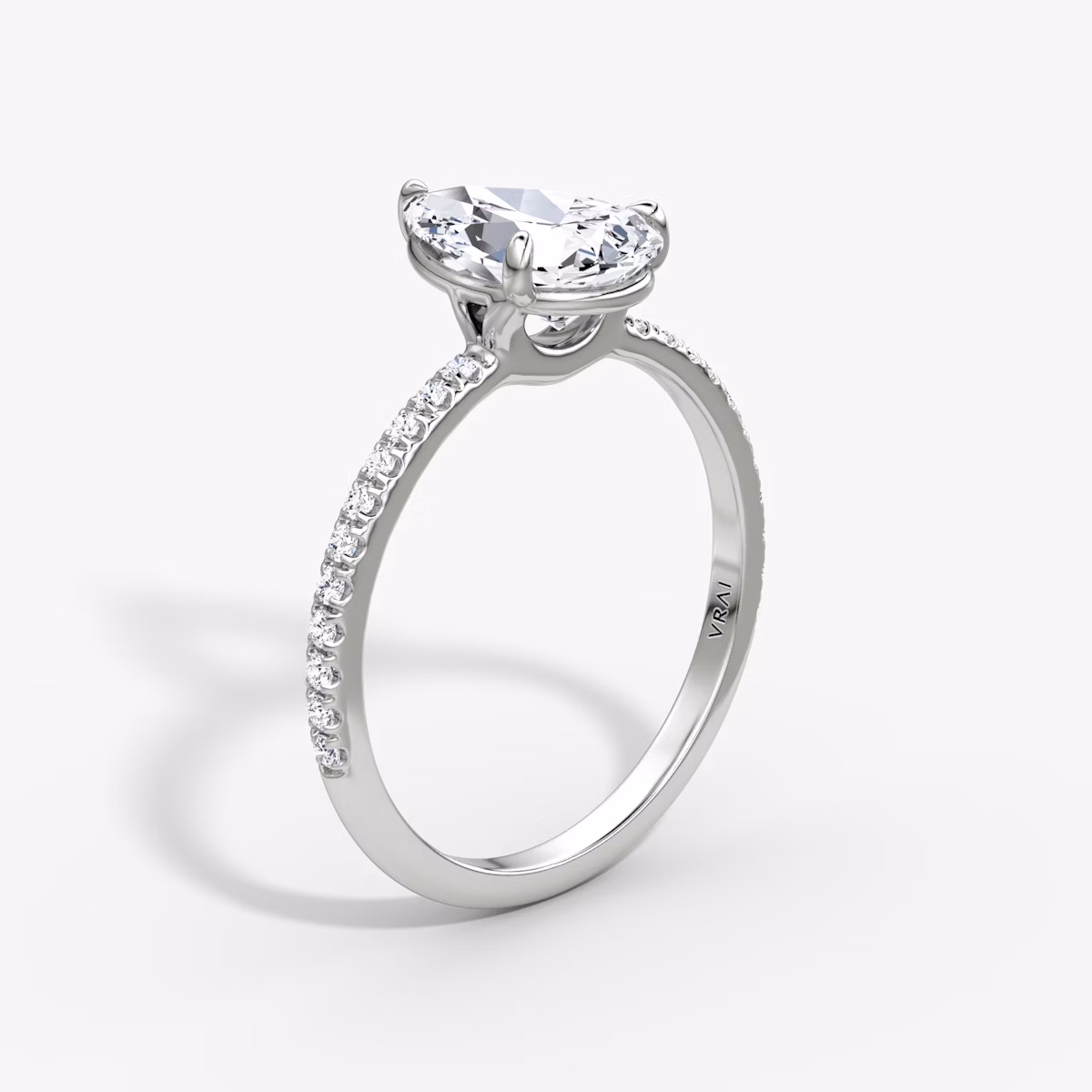 The Signature | Pear | 18k | White Gold | bandAccent: Pavé | bandWidth: standard | hiddenHalo: no | diamondOrientation: vertical | caratWeight: other