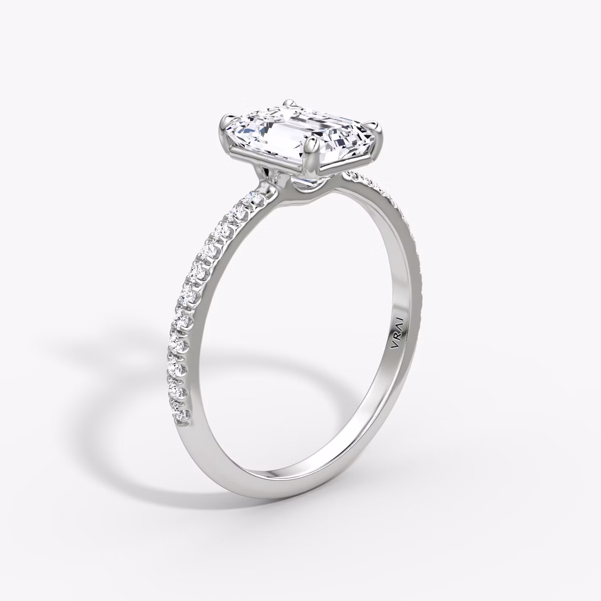 The Signature | Emerald | 18k | White Gold | bandAccent: Pavé | bandWidth: standard | hiddenHalo: no | diamondOrientation: vertical | caratWeight: other