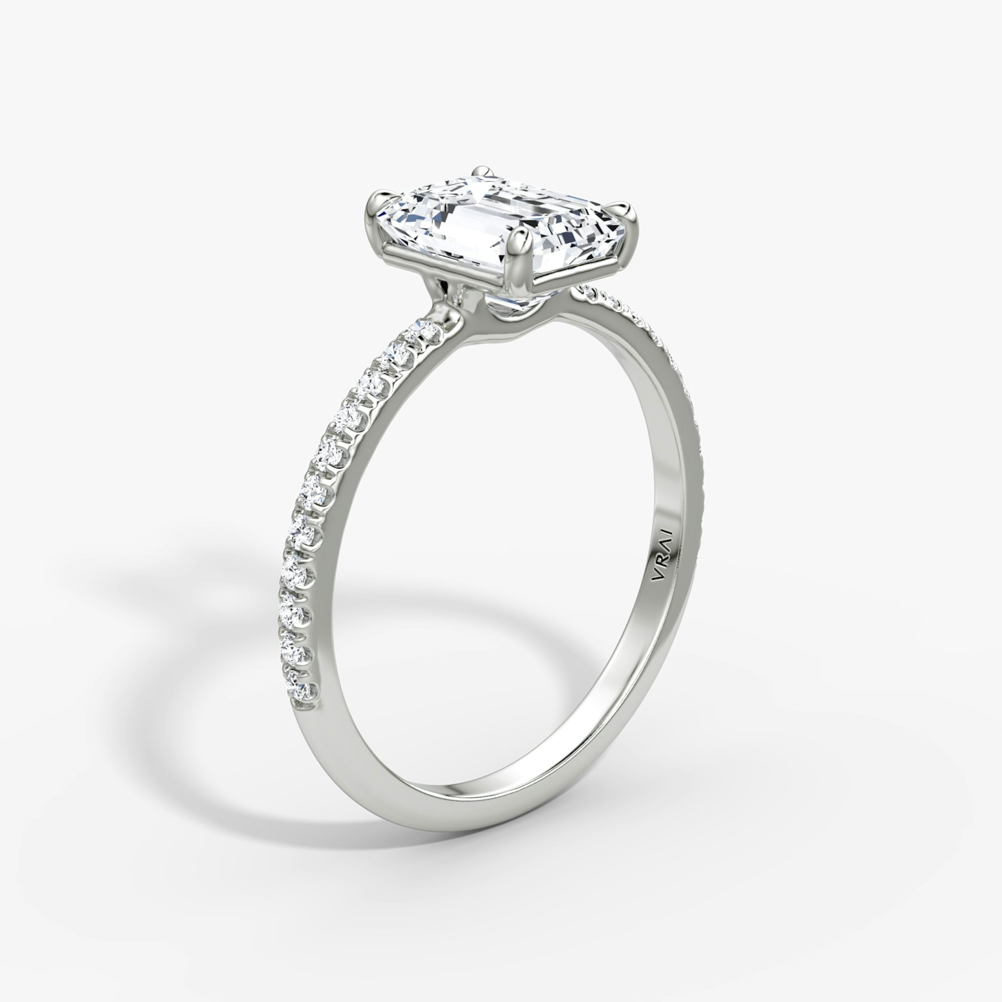 The Signature | Emerald | 18k | White Gold | bandAccent: Pavé | bandWidth: standard | hiddenHalo: no | diamondOrientation: vertical | caratWeight: other