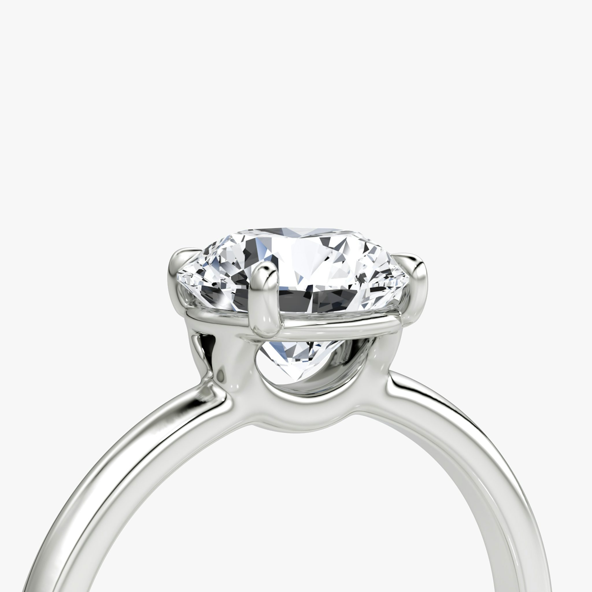 The Signature | Round Brilliant | Platinum | bandAccent: Plain | bandWidth: standard | caratWeight: 1.0ct | hiddenHalo: no | diamondOrientation: vertical