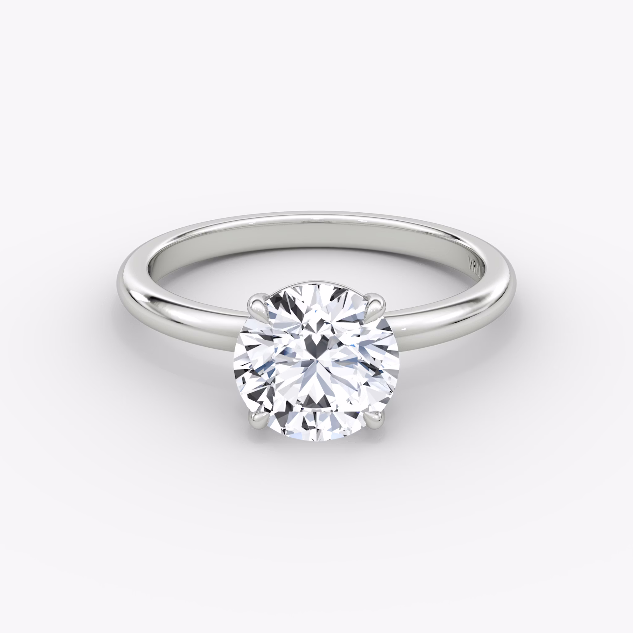 The Signature | Round Brilliant | Platinum | bandAccent: Plain | bandWidth: standard | caratWeight: 1.0ct | hiddenHalo: no | diamondOrientation: vertical