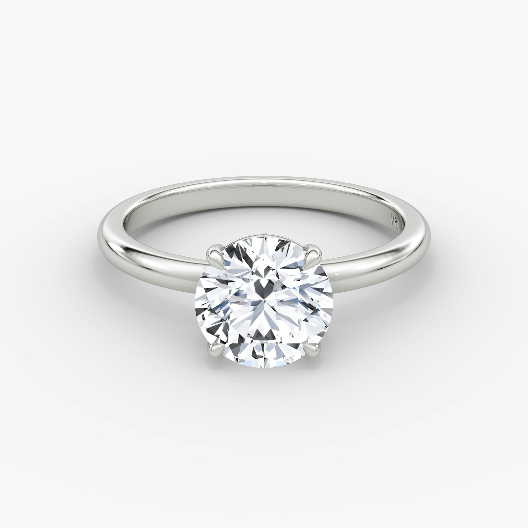The Signature | Round Brilliant | Platinum | bandAccent: Plain | bandWidth: standard | caratWeight: 1.0ct | hiddenHalo: no | diamondOrientation: vertical