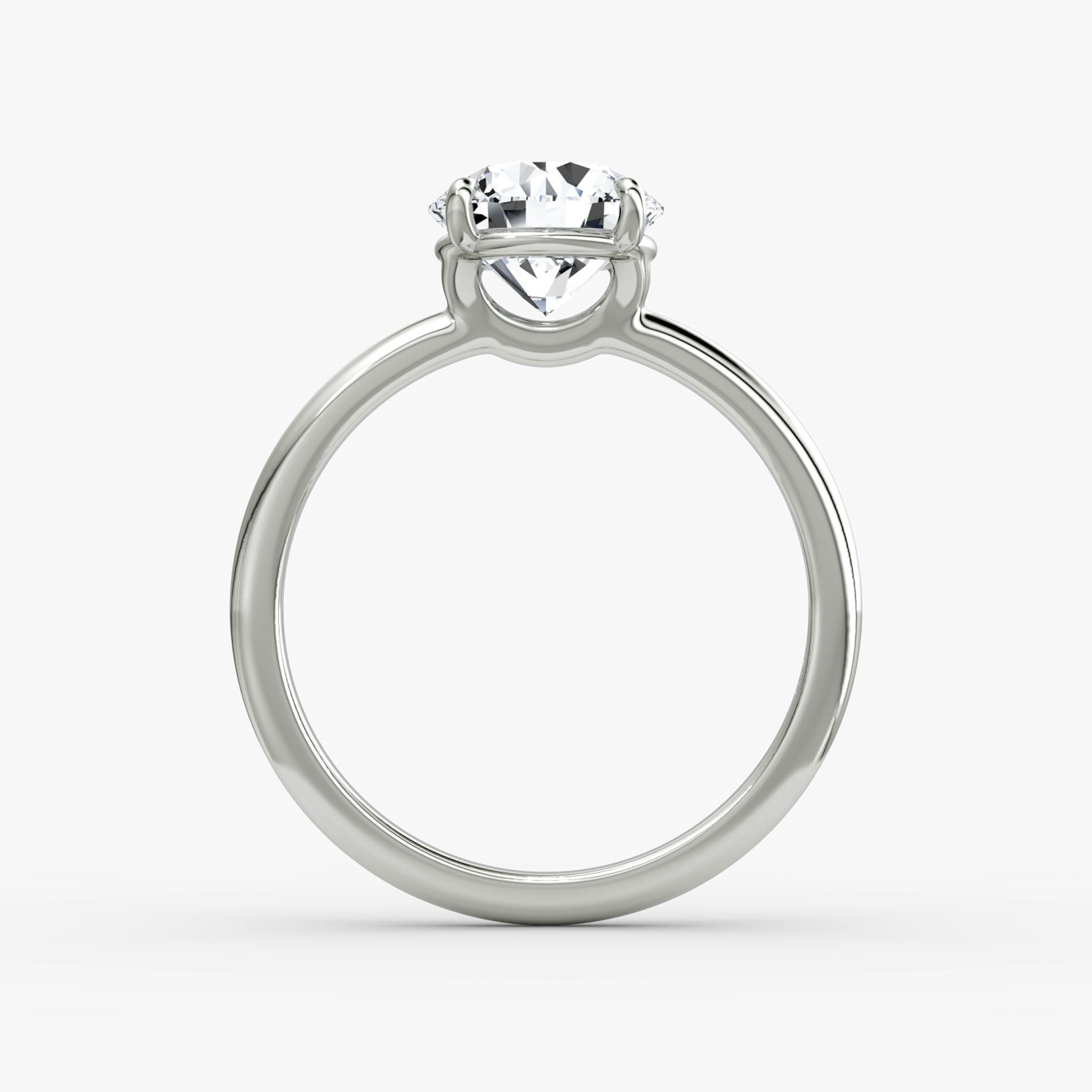 The Signature | Round Brilliant | Platinum | bandAccent: Plain | bandWidth: standard | caratWeight: 1.0ct | hiddenHalo: no | diamondOrientation: vertical