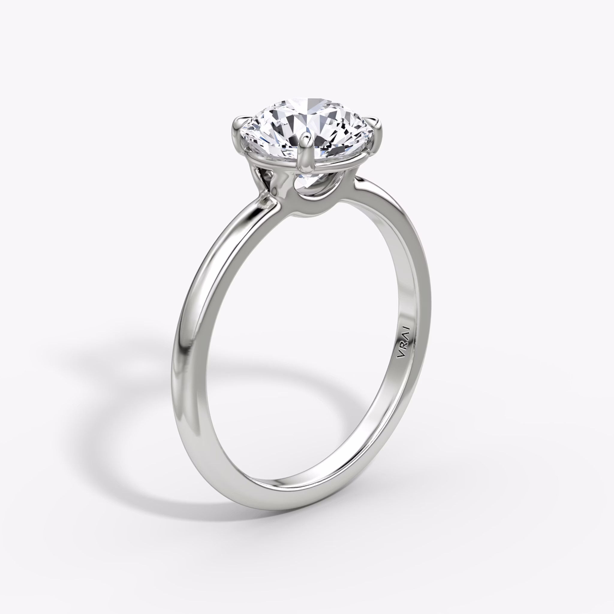 The Signature | Round Brilliant | Platinum | bandAccent: Plain | bandWidth: standard | caratWeight: 2.0ct | hiddenHalo: no | diamondOrientation: vertical