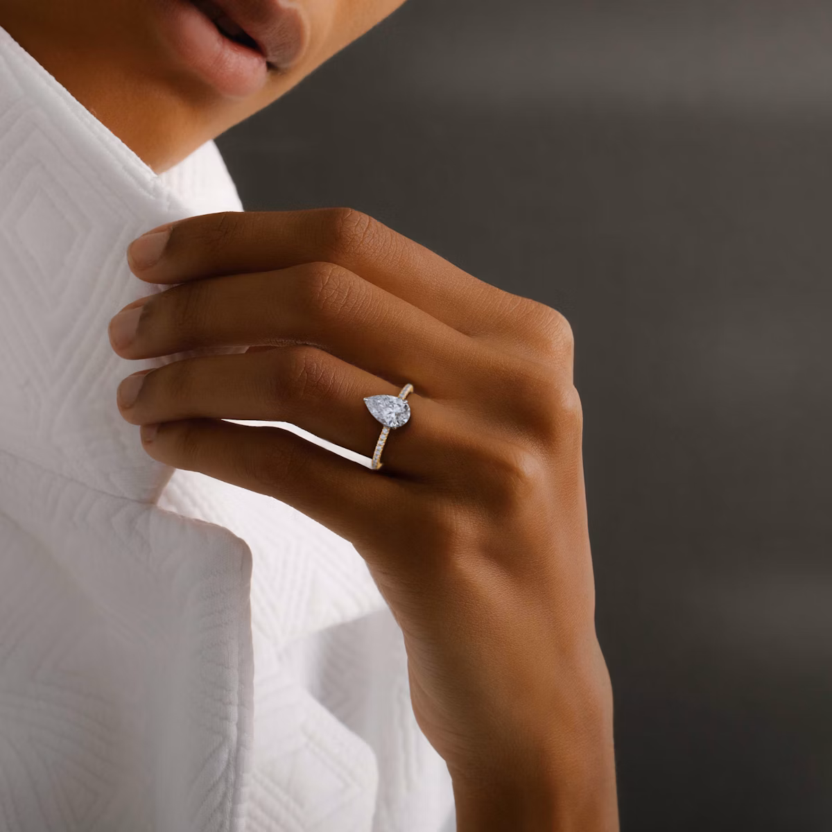 The Signature | Pear | 14k | Rose Gold and Platinum | bandAccent: Pavé | bandWidth: standard | hiddenHalo: no | diamondOrientation: vertical | caratWeight: other