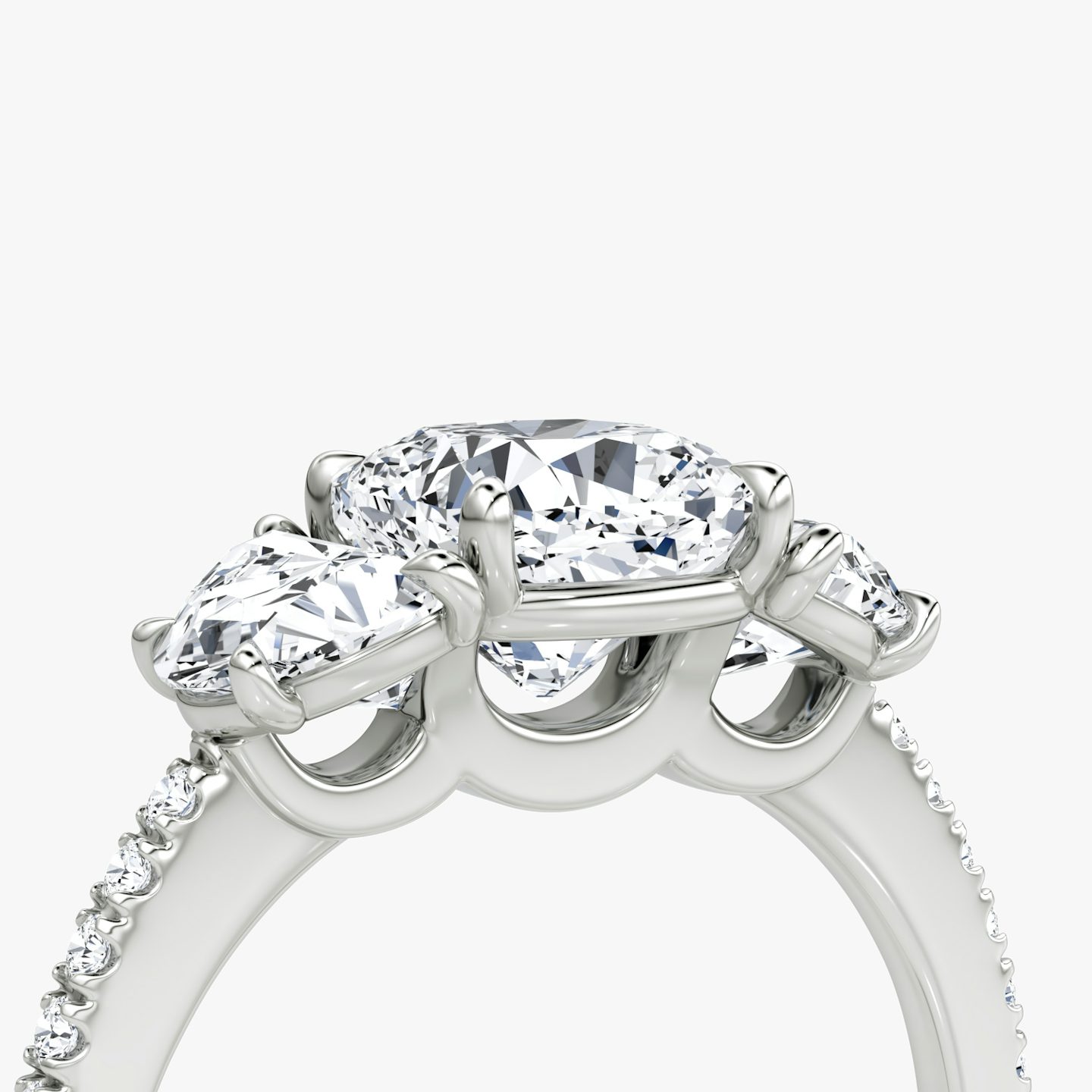 The Three Stone | Cushion | Platinum | bandAccent: Pavé | sideStoneCarat: 0.50ct | sideStoneShape: Half Moon | diamondOrientation: vertical | caratWeight: other
