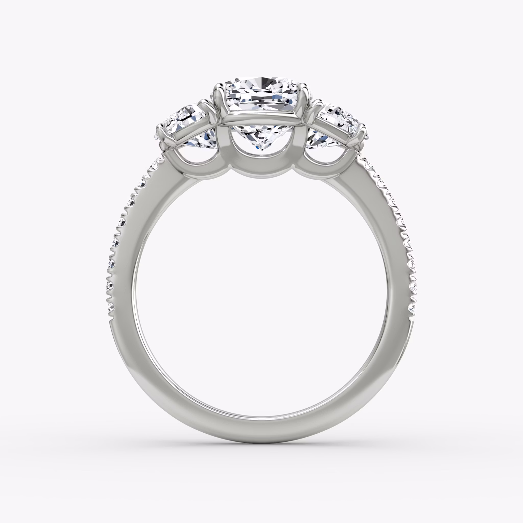 The Three Stone | Cushion | 18k | White Gold | bandAccent: Pavé | sideStoneCarat: 0.50ct | sideStoneShape: Half Moon | diamondOrientation: vertical | caratWeight: other