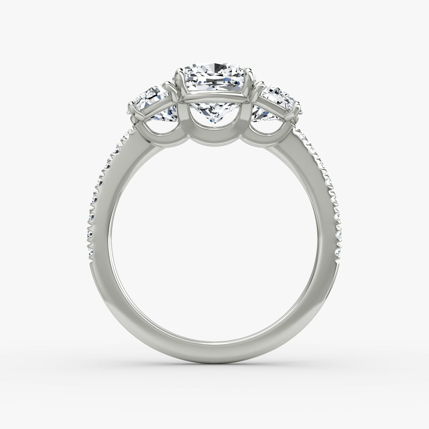 The Three Stone | Cushion | Platinum | bandAccent: Pavé | sideStoneCarat: 0.50ct | sideStoneShape: Half Moon | diamondOrientation: vertical | caratWeight: other