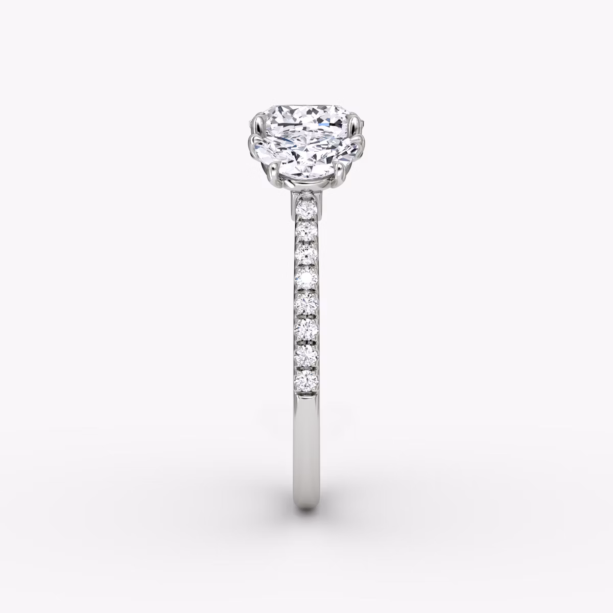 The Three Stone | Cushion | Platinum | bandAccent: Pavé | sideStoneCarat: 0.50ct | sideStoneShape: Half Moon | diamondOrientation: vertical | caratWeight: other
