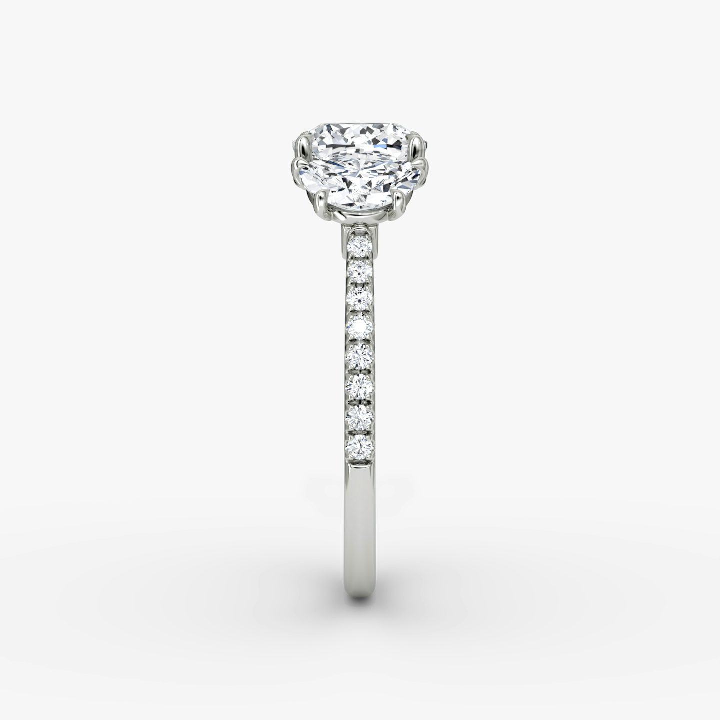 The Three Stone | Cushion | Platinum | bandAccent: Pavé | sideStoneCarat: 0.50ct | sideStoneShape: Half Moon | diamondOrientation: vertical | caratWeight: other