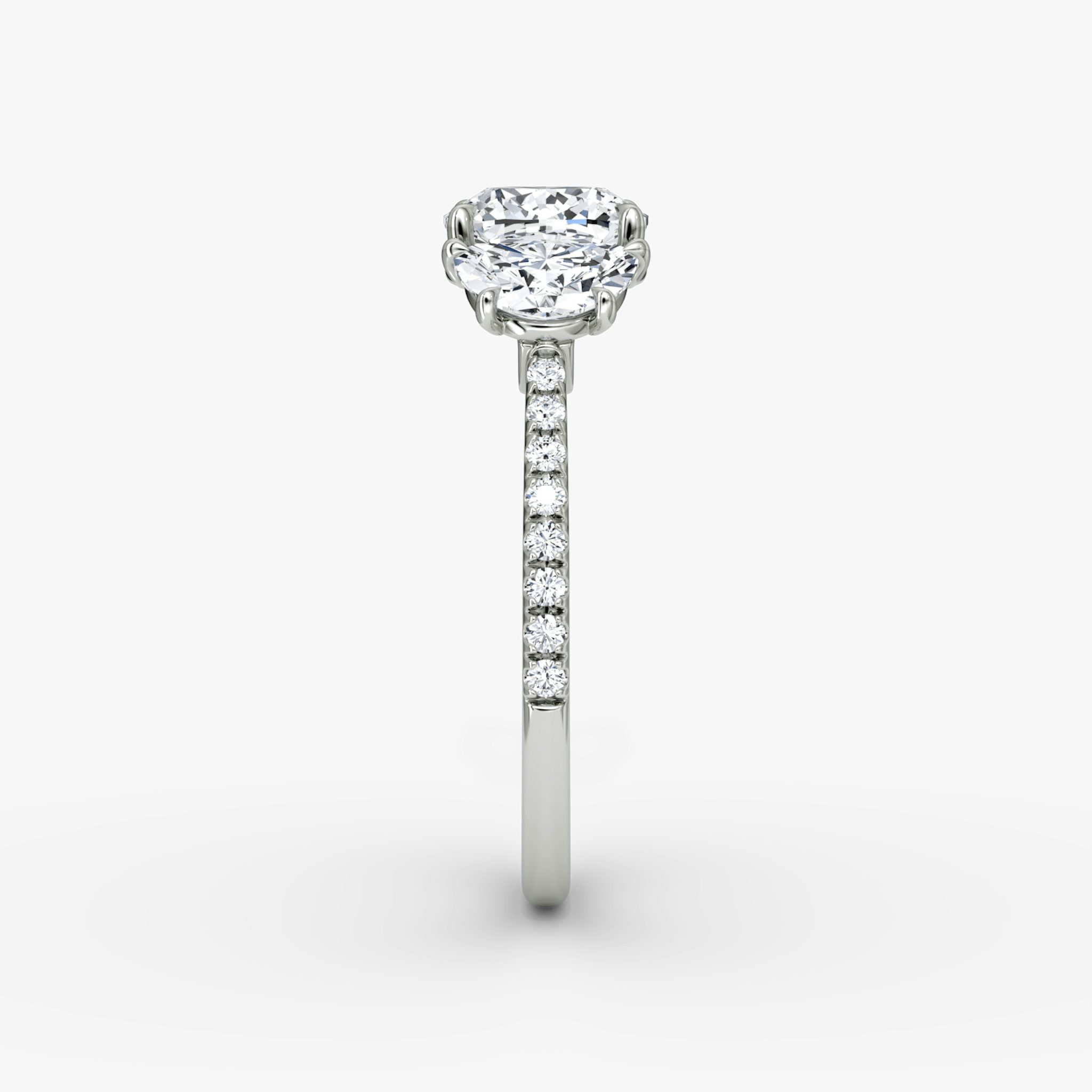 The Three Stone | Cushion | 18k | White Gold | bandAccent: Pavé | sideStoneCarat: 0.50ct | sideStoneShape: Half Moon | diamondOrientation: vertical | caratWeight: other