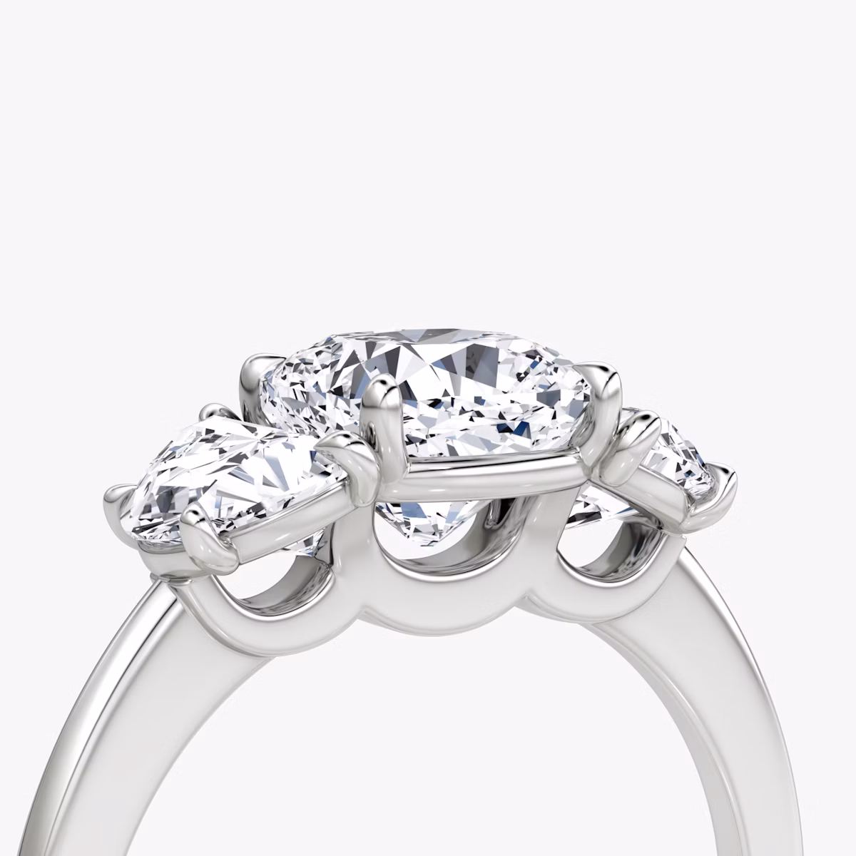 The Three Stone | Cushion | Platinum | bandAccent: Plain | sideStoneCarat: 0.50ct | sideStoneShape: Half Moon | diamondOrientation: vertical | caratWeight: other