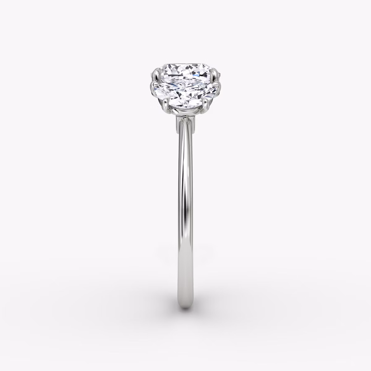 The Three Stone | Cushion | Platinum | bandAccent: Plain | sideStoneCarat: 0.50ct | sideStoneShape: Half Moon | diamondOrientation: vertical | caratWeight: other