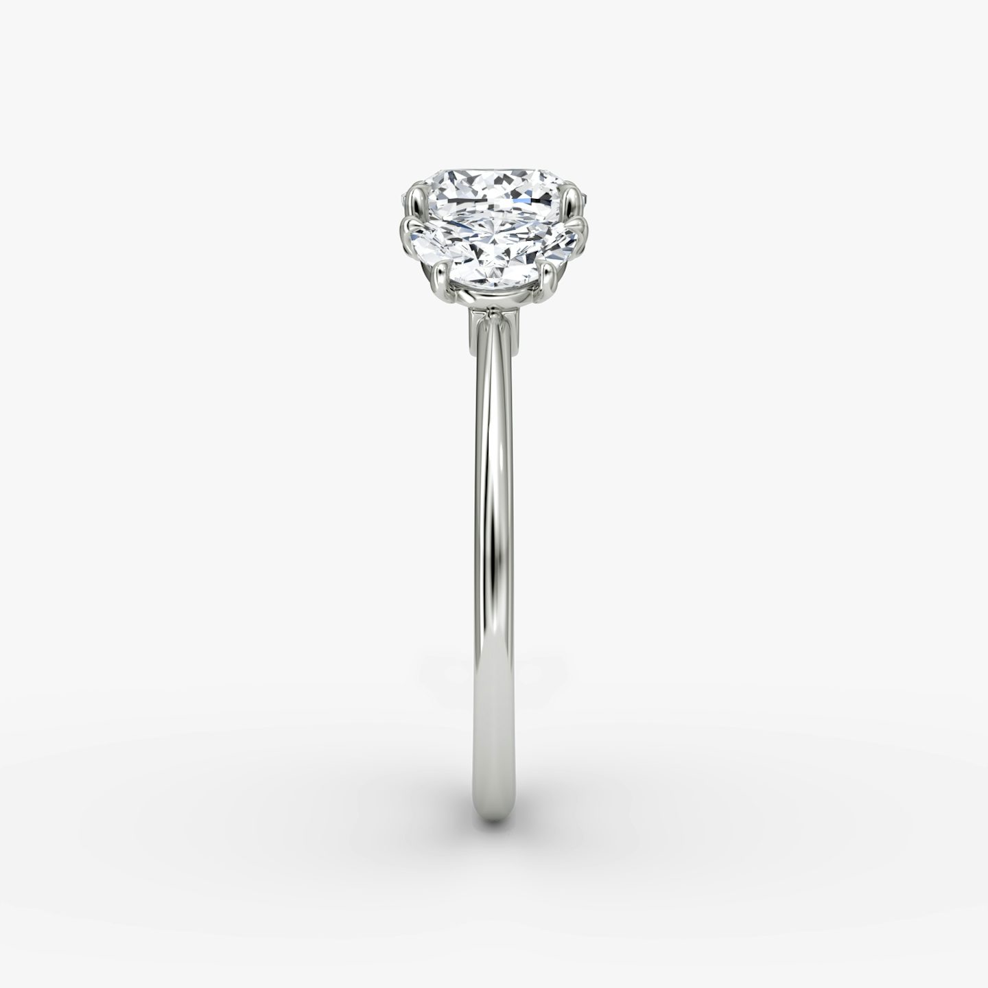 The Three Stone | Cushion | Platinum | bandAccent: Plain | sideStoneCarat: 0.50ct | sideStoneShape: Half Moon | diamondOrientation: vertical | caratWeight: other
