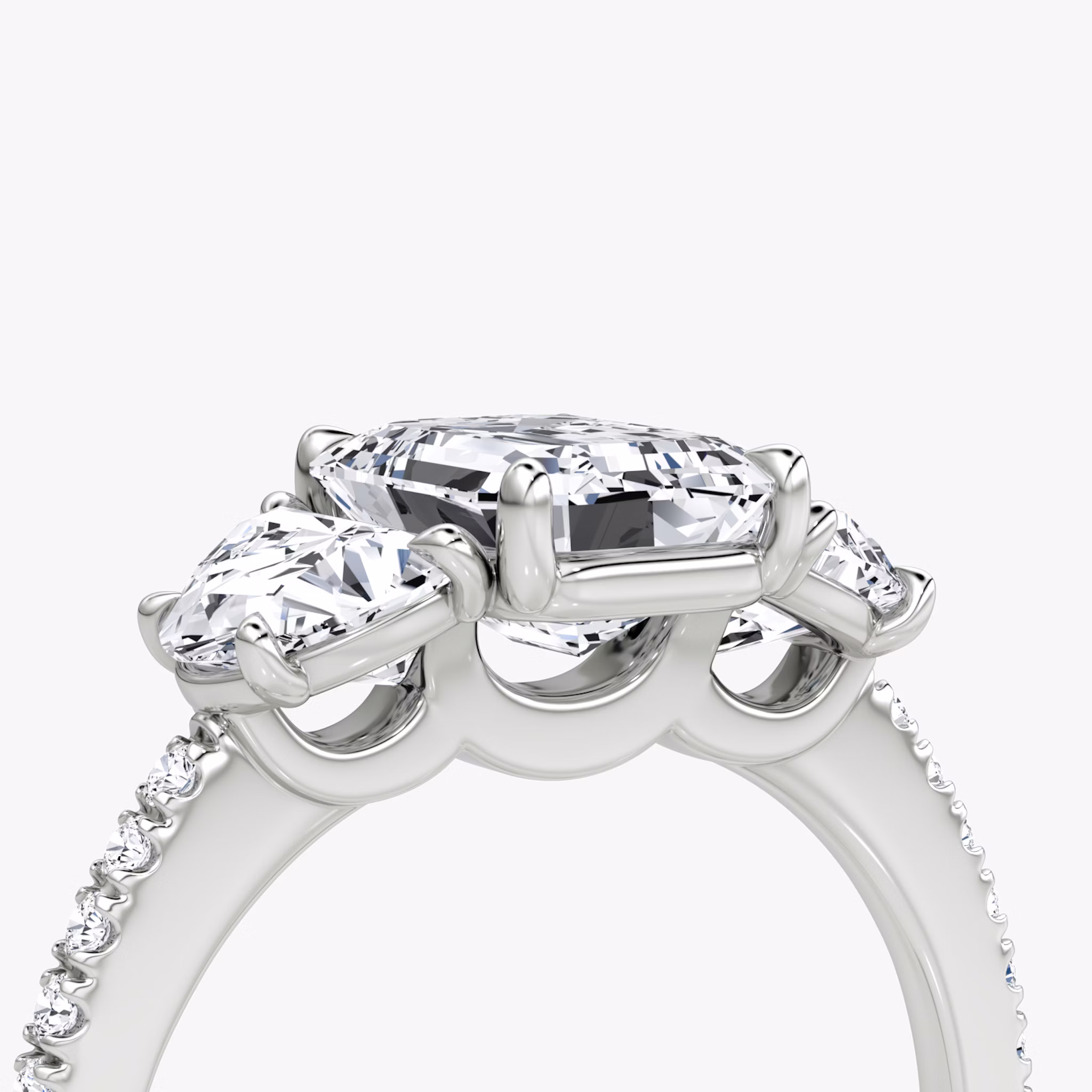 The Three Stone | Emerald | 18k | White Gold | bandAccent: Pavé | sideStoneCarat: 0.50ct | sideStoneShape: Half Moon | diamondOrientation: vertical | caratWeight: other