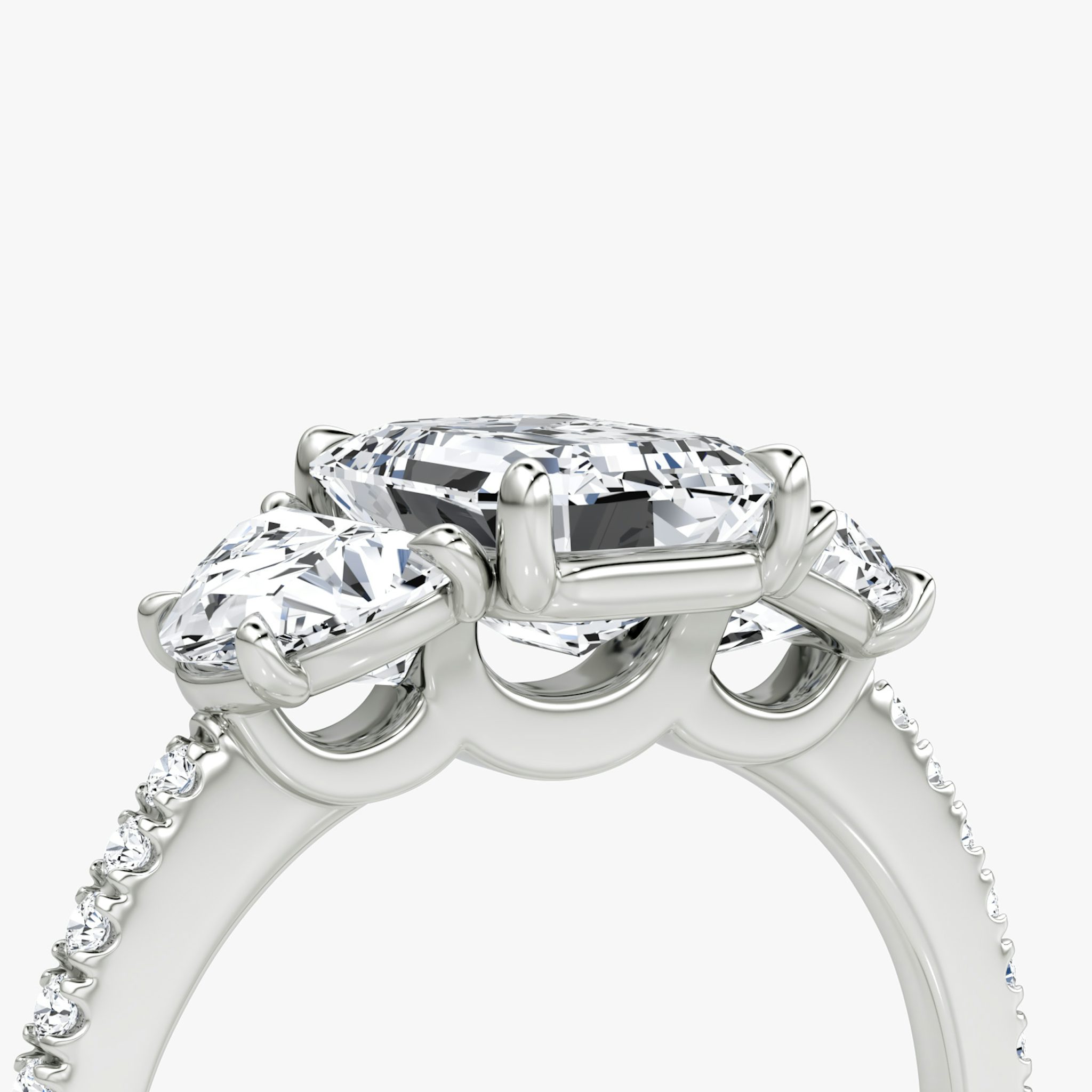 The Three Stone | Emerald | 18k | White Gold | bandAccent: Pavé | sideStoneCarat: 0.50ct | sideStoneShape: Half Moon | diamondOrientation: vertical | caratWeight: other