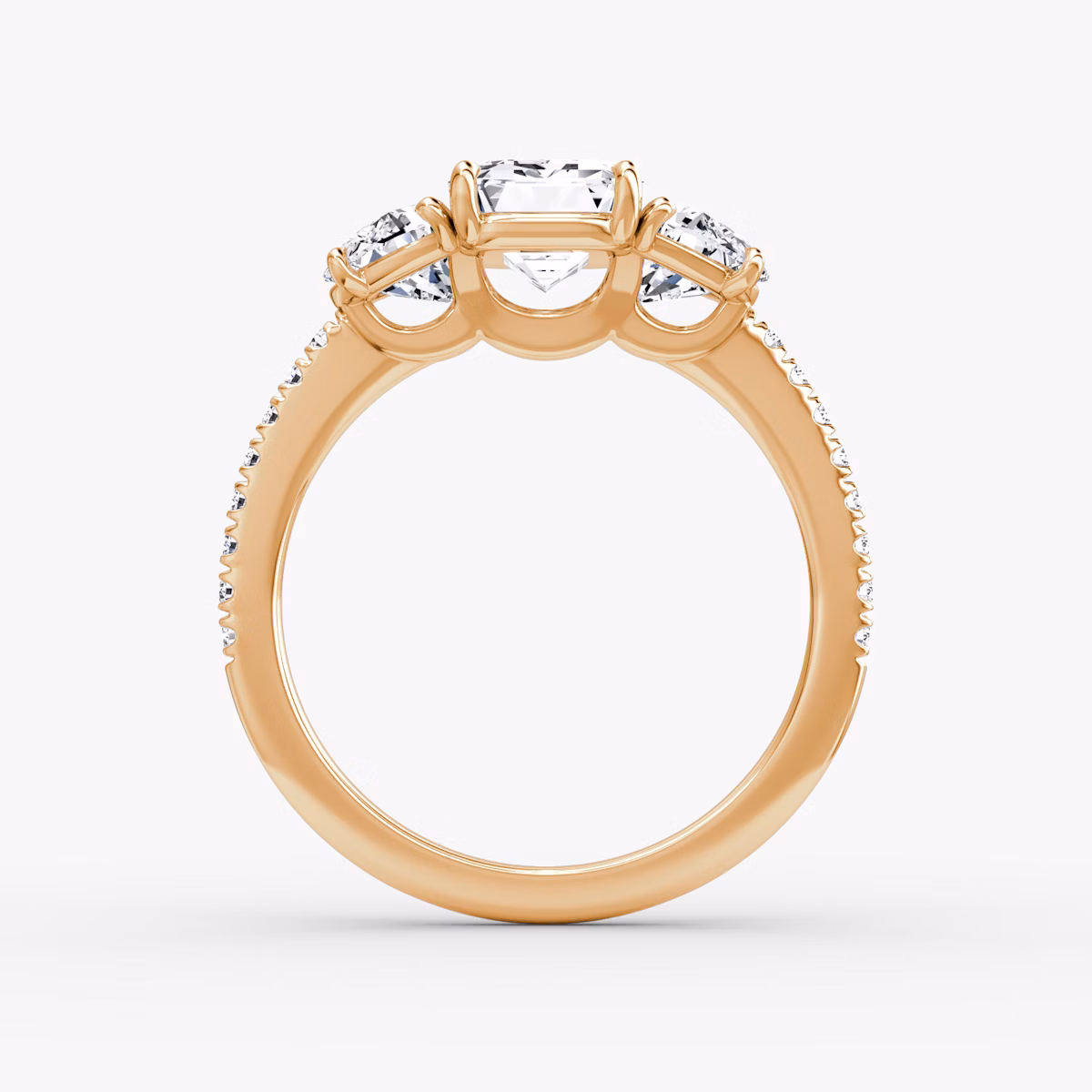 The Three Stone | Emerald | 14k | Rose Gold | bandAccent: Pavé | sideStoneCarat: 0.50ct | sideStoneShape: Half Moon | diamondOrientation: vertical | caratWeight: other