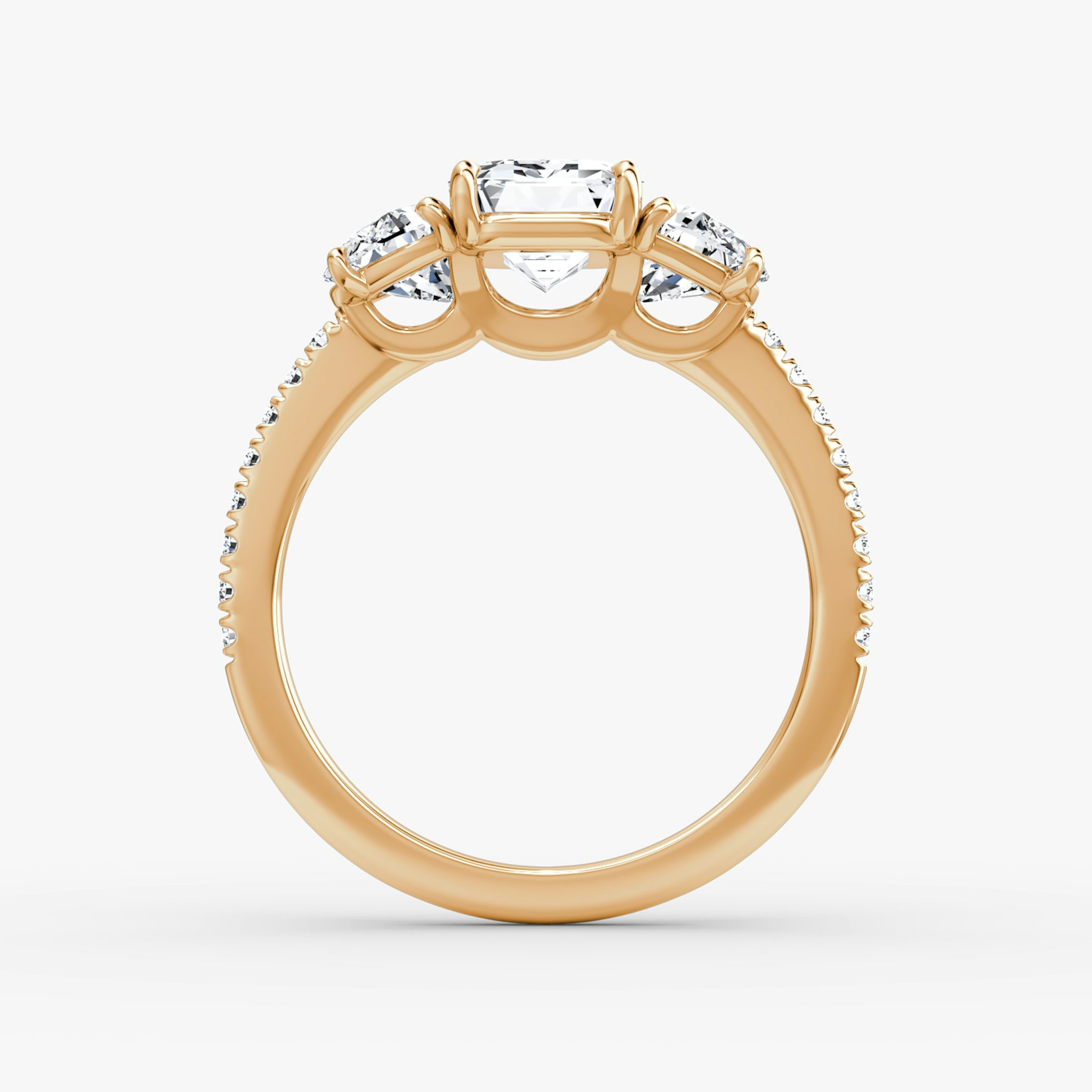 The Three Stone | Emerald | 14k | Rose Gold | bandAccent: Pavé | sideStoneCarat: 0.50ct | sideStoneShape: Half Moon | diamondOrientation: vertical | caratWeight: other