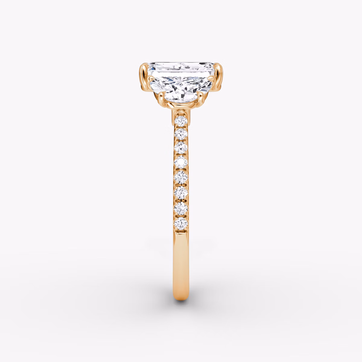 The Three Stone | Emerald | 14k | Rose Gold | bandAccent: Pavé | sideStoneCarat: 0.50ct | sideStoneShape: Half Moon | diamondOrientation: vertical | caratWeight: other