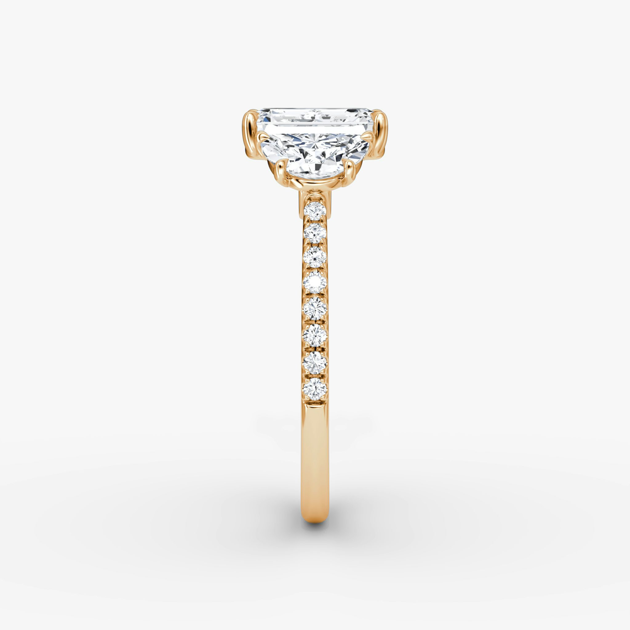 The Three Stone | Emerald | 14k | Rose Gold | bandAccent: Pavé | sideStoneCarat: 0.50ct | sideStoneShape: Half Moon | diamondOrientation: vertical | caratWeight: other