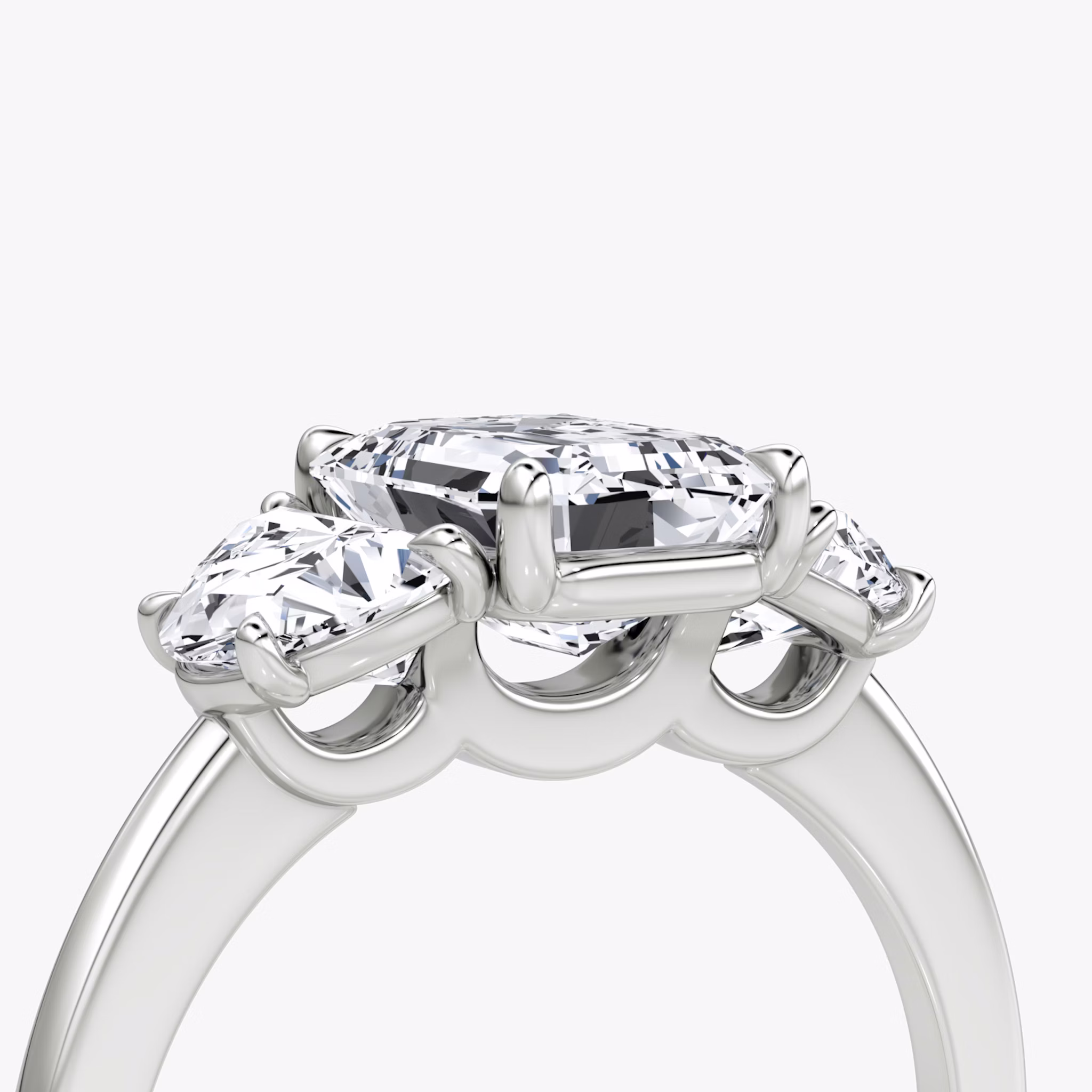 The Three Stone | Emerald | 18k | White Gold | bandAccent: Plain | sideStoneCarat: 0.50ct | sideStoneShape: Half Moon | diamondOrientation: vertical | caratWeight: other