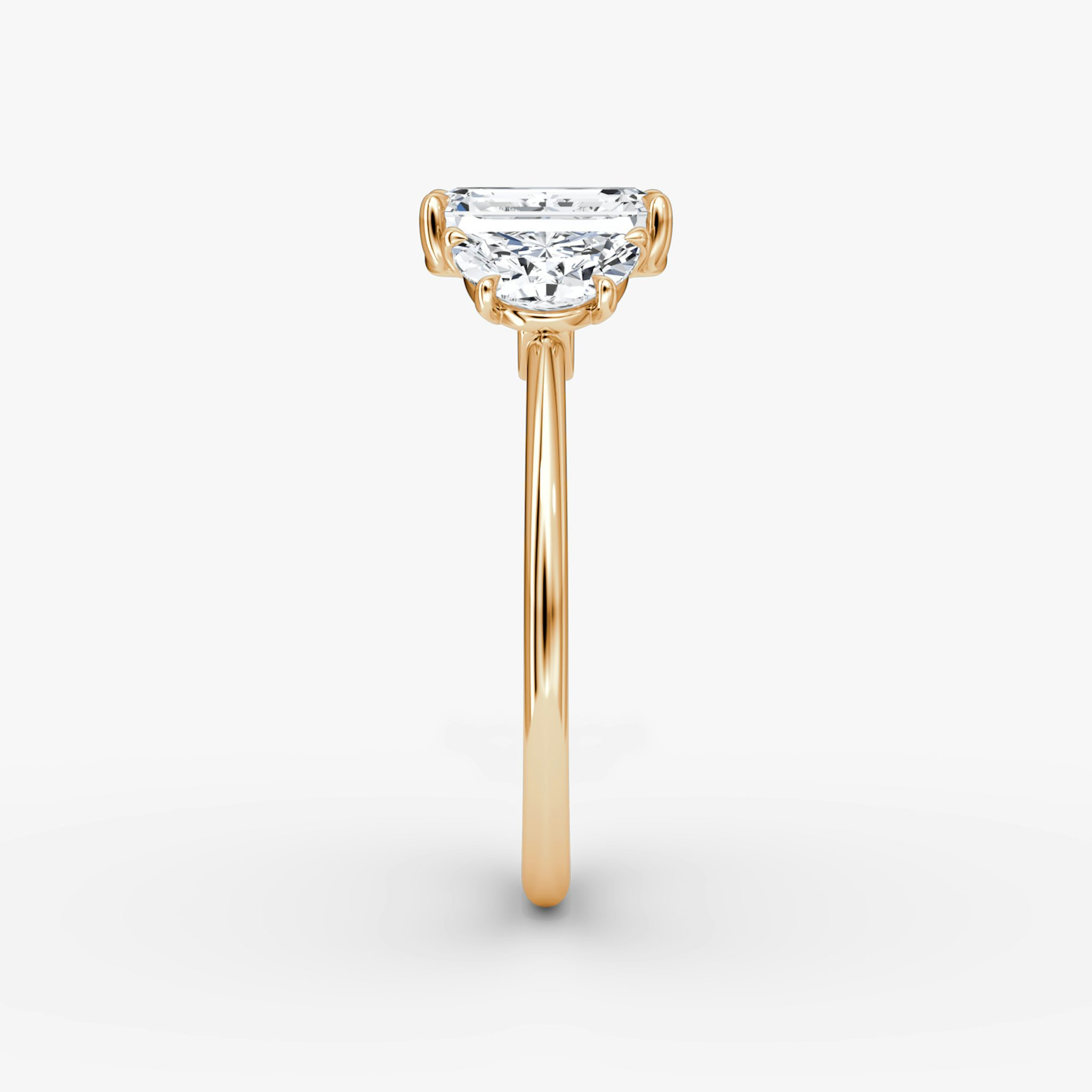 The Three Stone | Emerald | 14k | Rose Gold | bandAccent: Plain | sideStoneCarat: 0.50ct | sideStoneShape: Half Moon | diamondOrientation: vertical | caratWeight: other