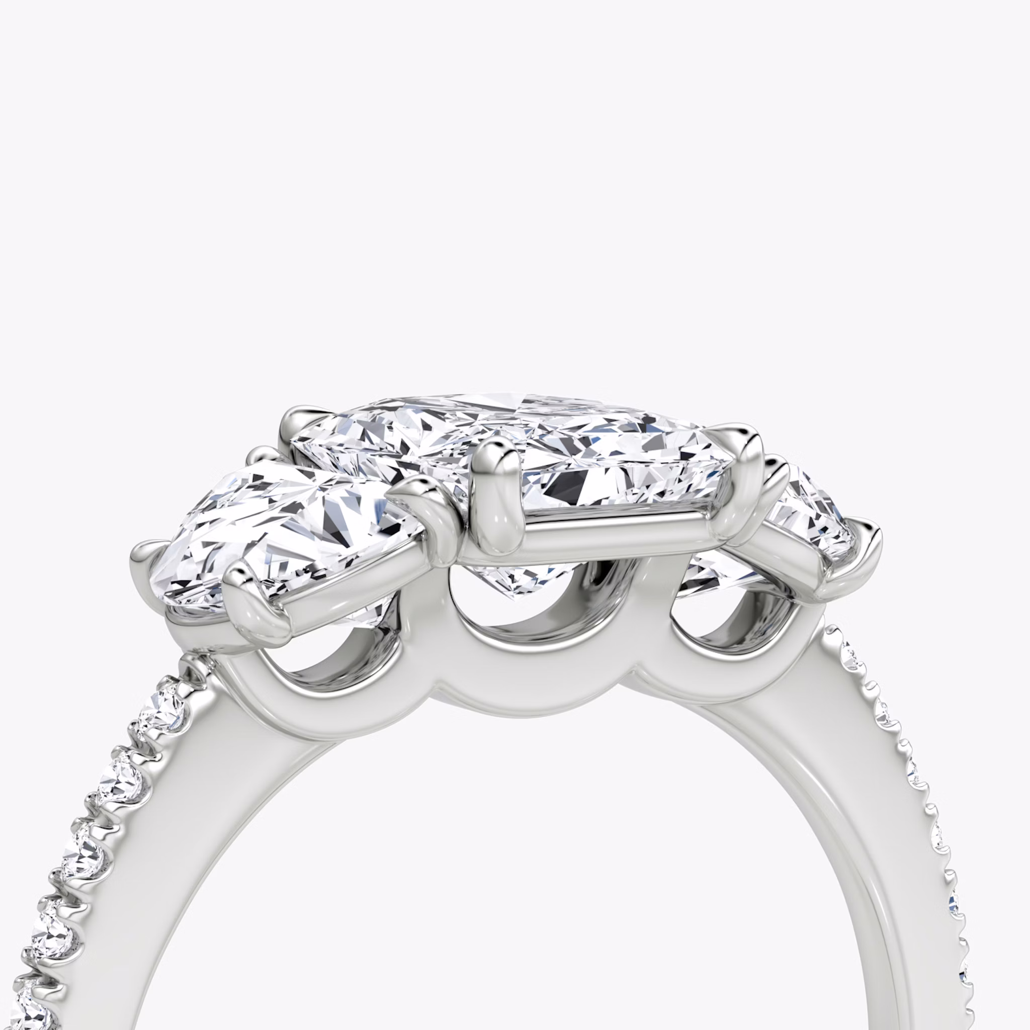 The Three Stone | Radiant | 18k | White Gold | bandAccent: Pavé | sideStoneCarat: 0.50ct | sideStoneShape: Half Moon | diamondOrientation: vertical | caratWeight: other