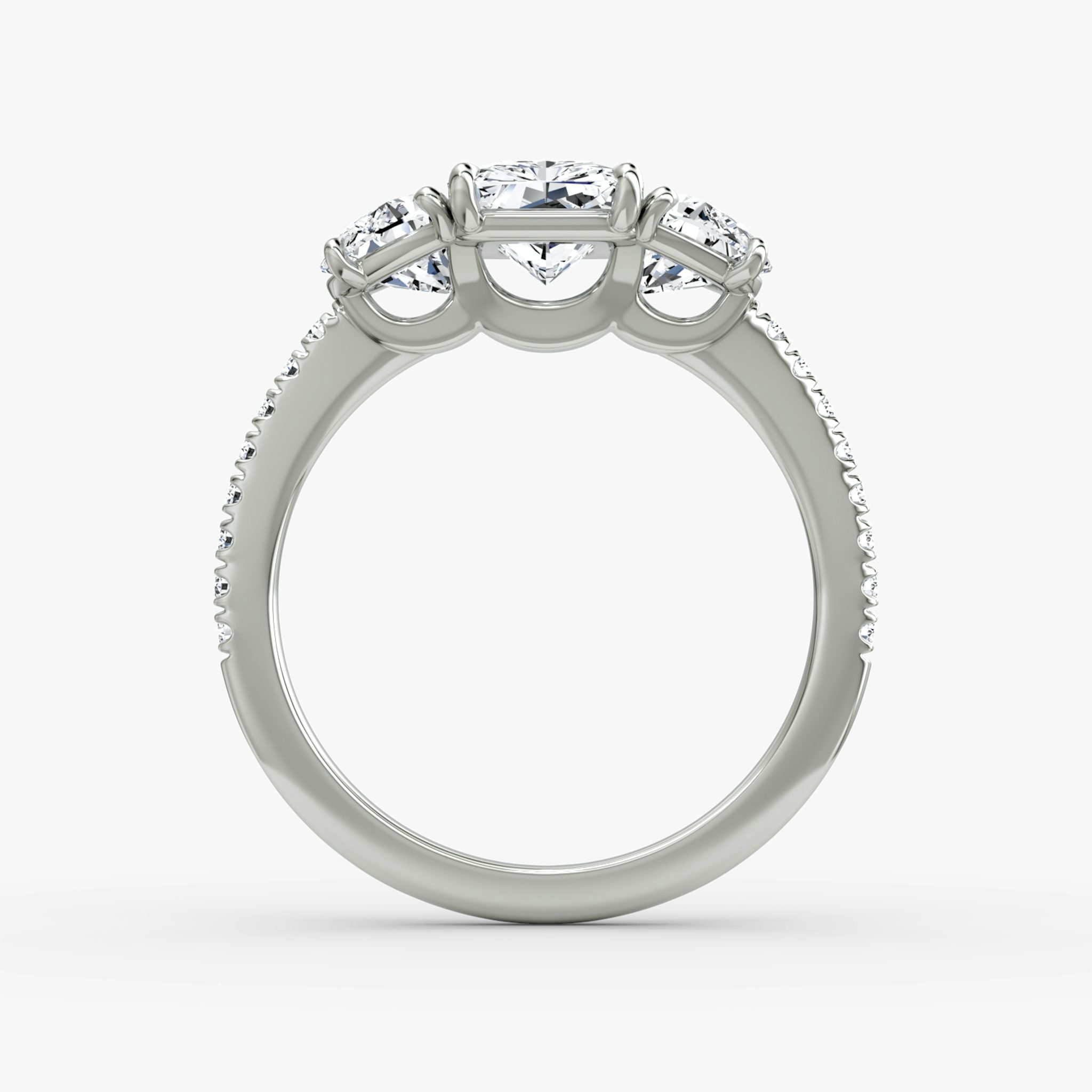The Three Stone | Radiant | 18k | White Gold | bandAccent: Pavé | sideStoneCarat: 0.50ct | sideStoneShape: Half Moon | diamondOrientation: vertical | caratWeight: other