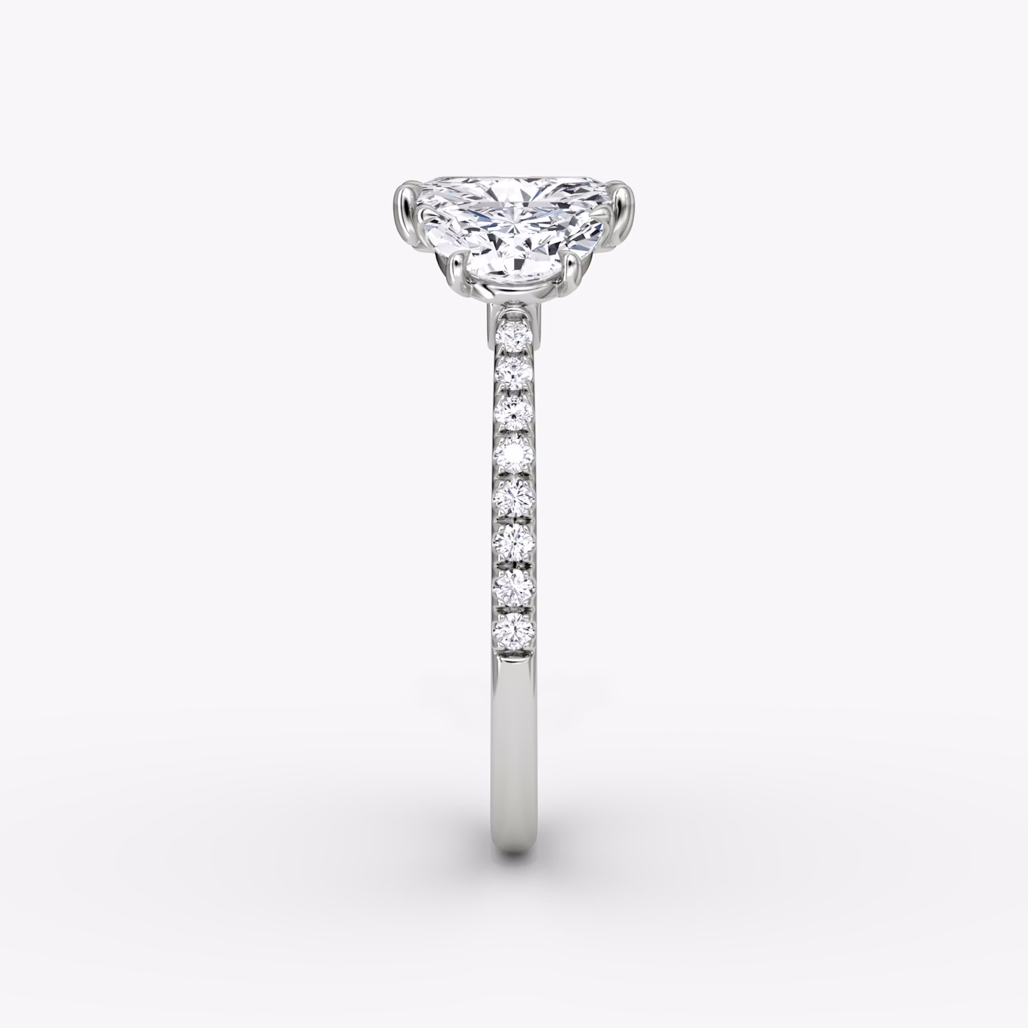 The Three Stone | Radiant | 18k | White Gold | bandAccent: Pavé | sideStoneCarat: 0.50ct | sideStoneShape: Half Moon | diamondOrientation: vertical | caratWeight: other