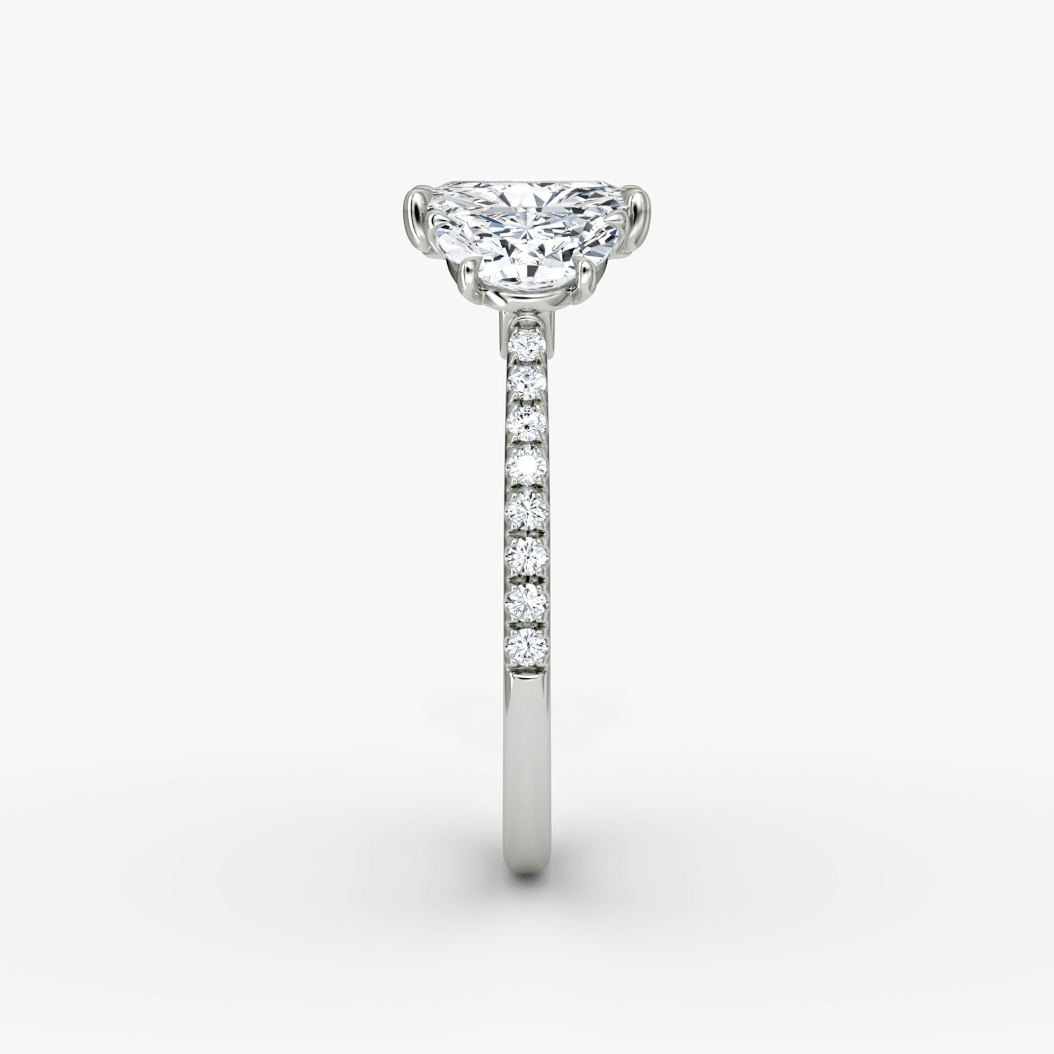 The Three Stone | Radiant | 18k | White Gold | bandAccent: Pavé | sideStoneCarat: 0.50ct | sideStoneShape: Half Moon | diamondOrientation: vertical | caratWeight: other