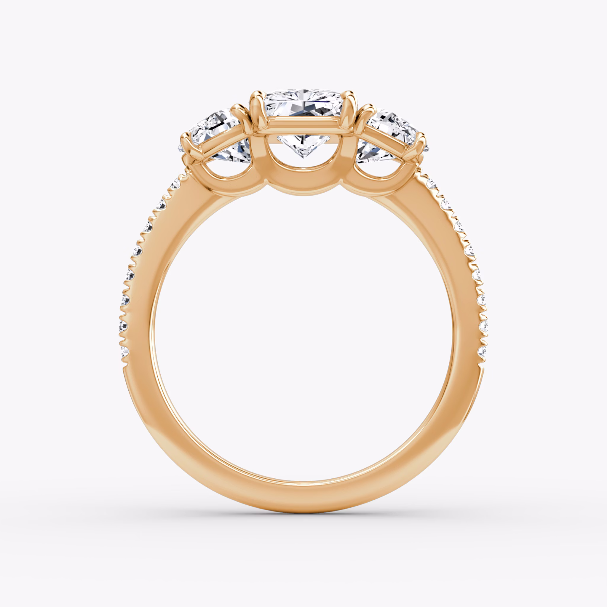 The Three Stone | Radiant | 14k | Rose Gold | bandAccent: Pavé | sideStoneCarat: 0.50ct | sideStoneShape: Half Moon | diamondOrientation: vertical | caratWeight: other